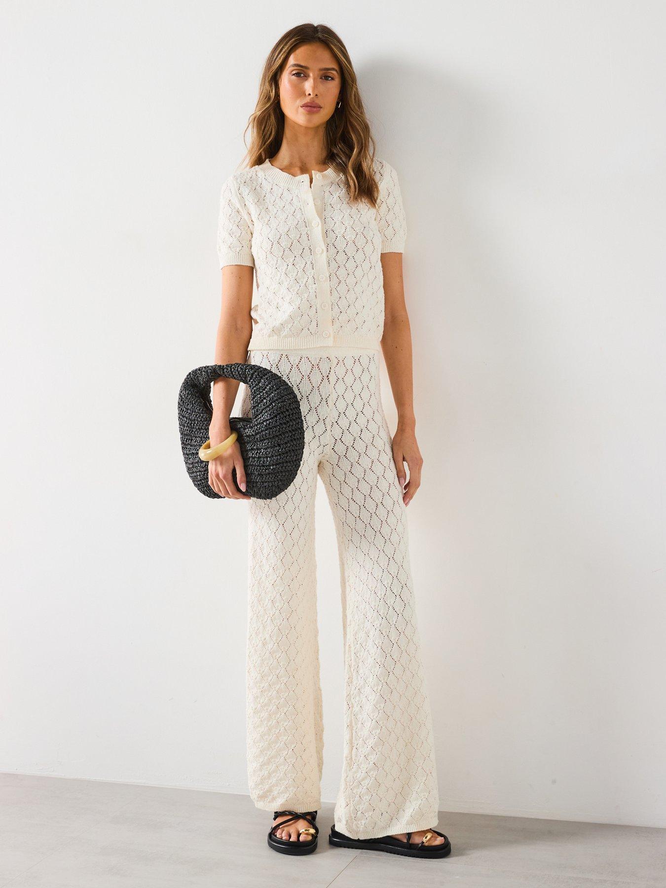  image of mango-short-sleeved-openwork-knitted-cardigan-cream