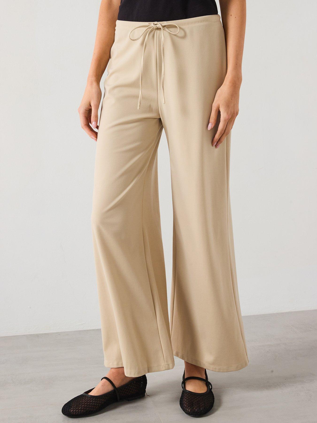 front image of mango-candela-trousers-beige