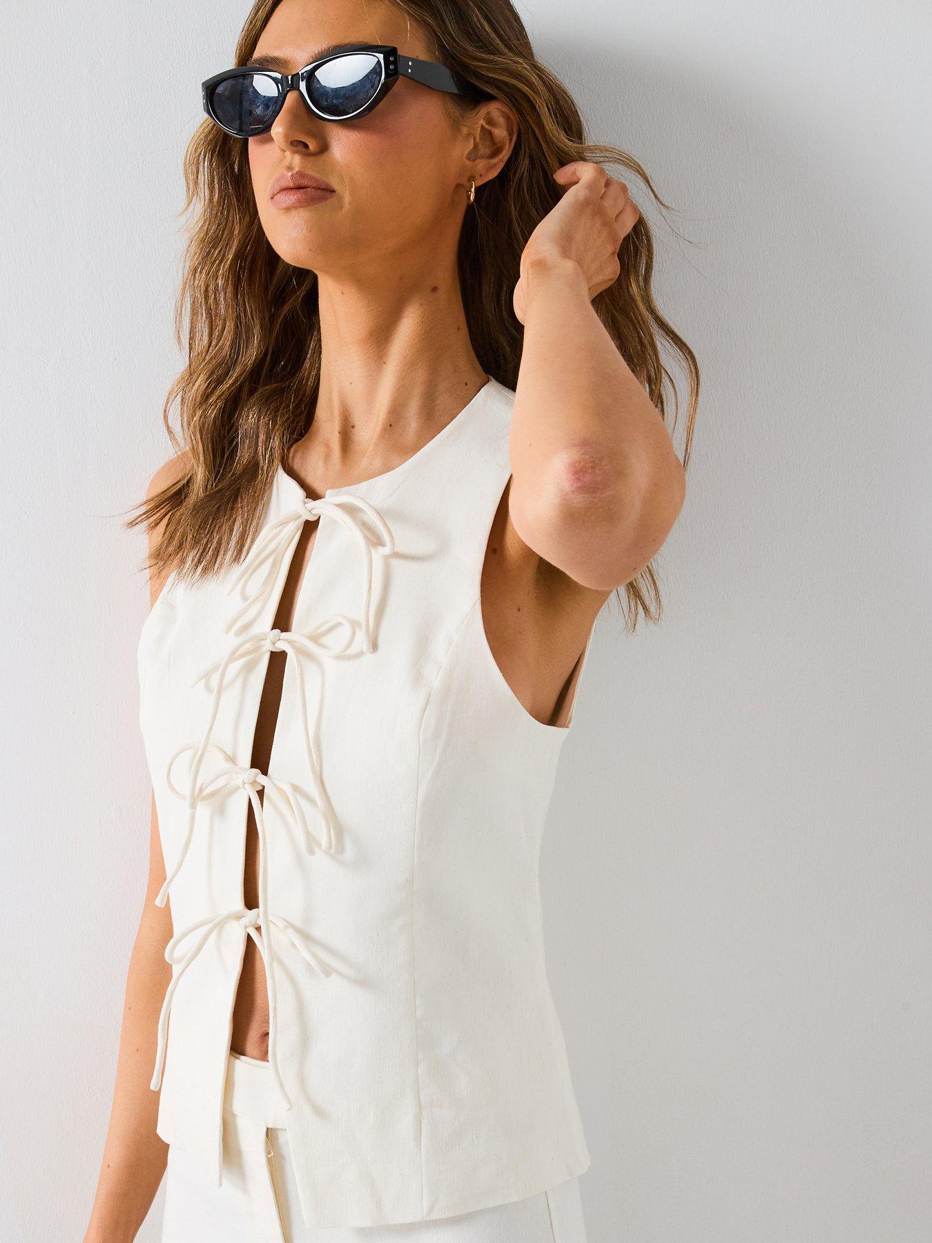  image of mango-linen-blend-bow-top-cream