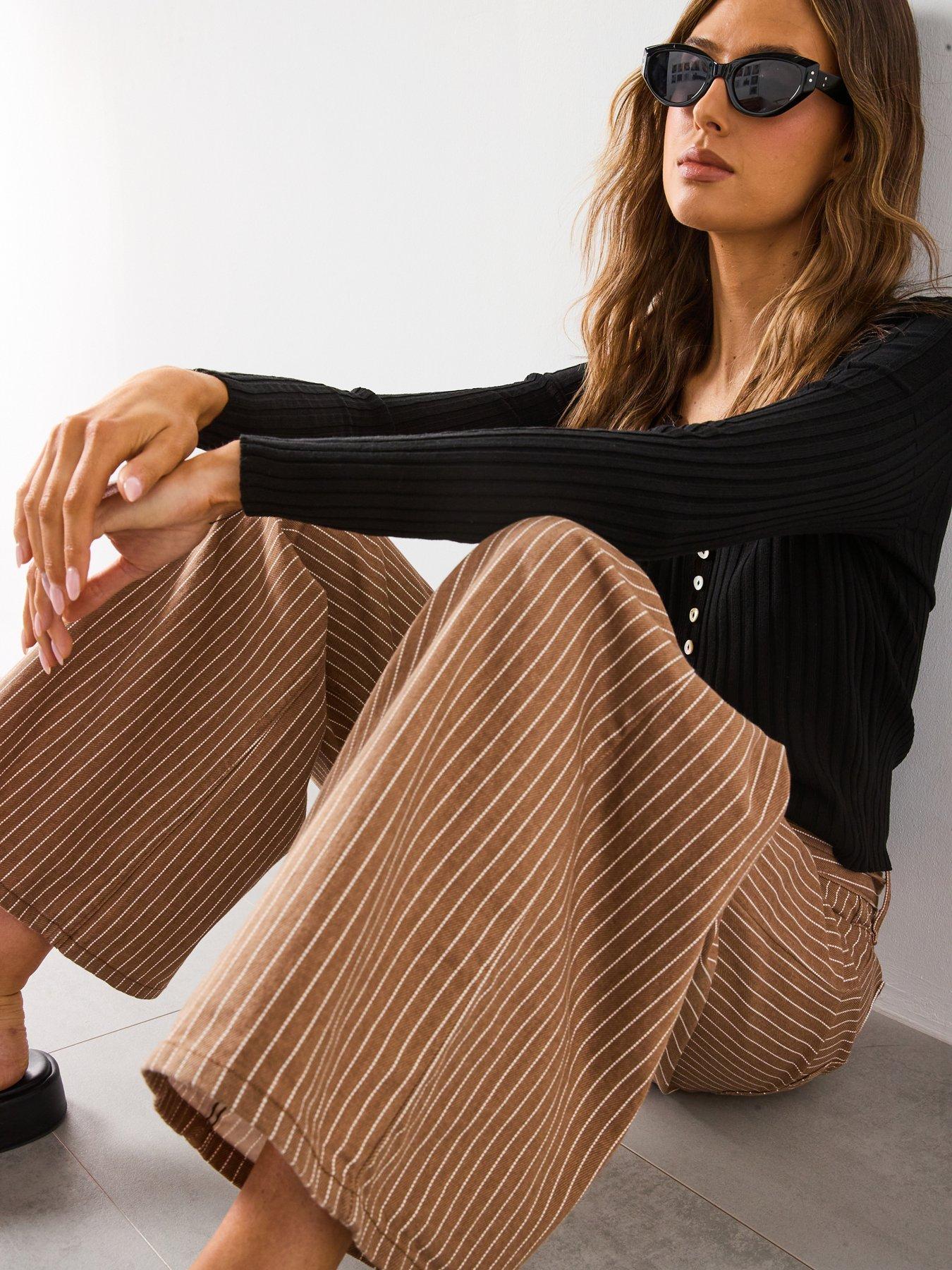  image of mango-wide-leg-jeans-with-stripes-and-belt-brown