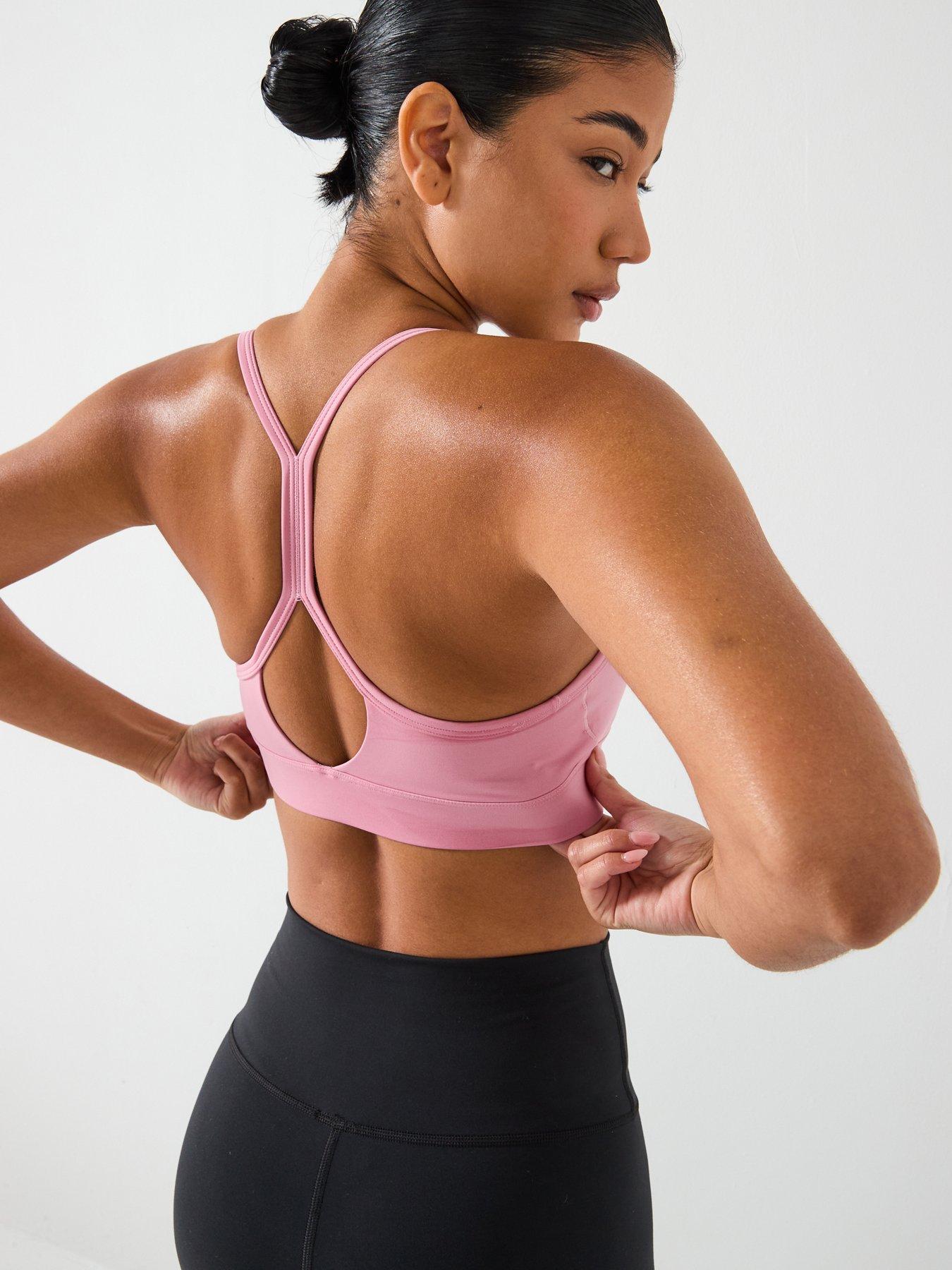  image of new-balance-womens-essential-yoga-bra-pink