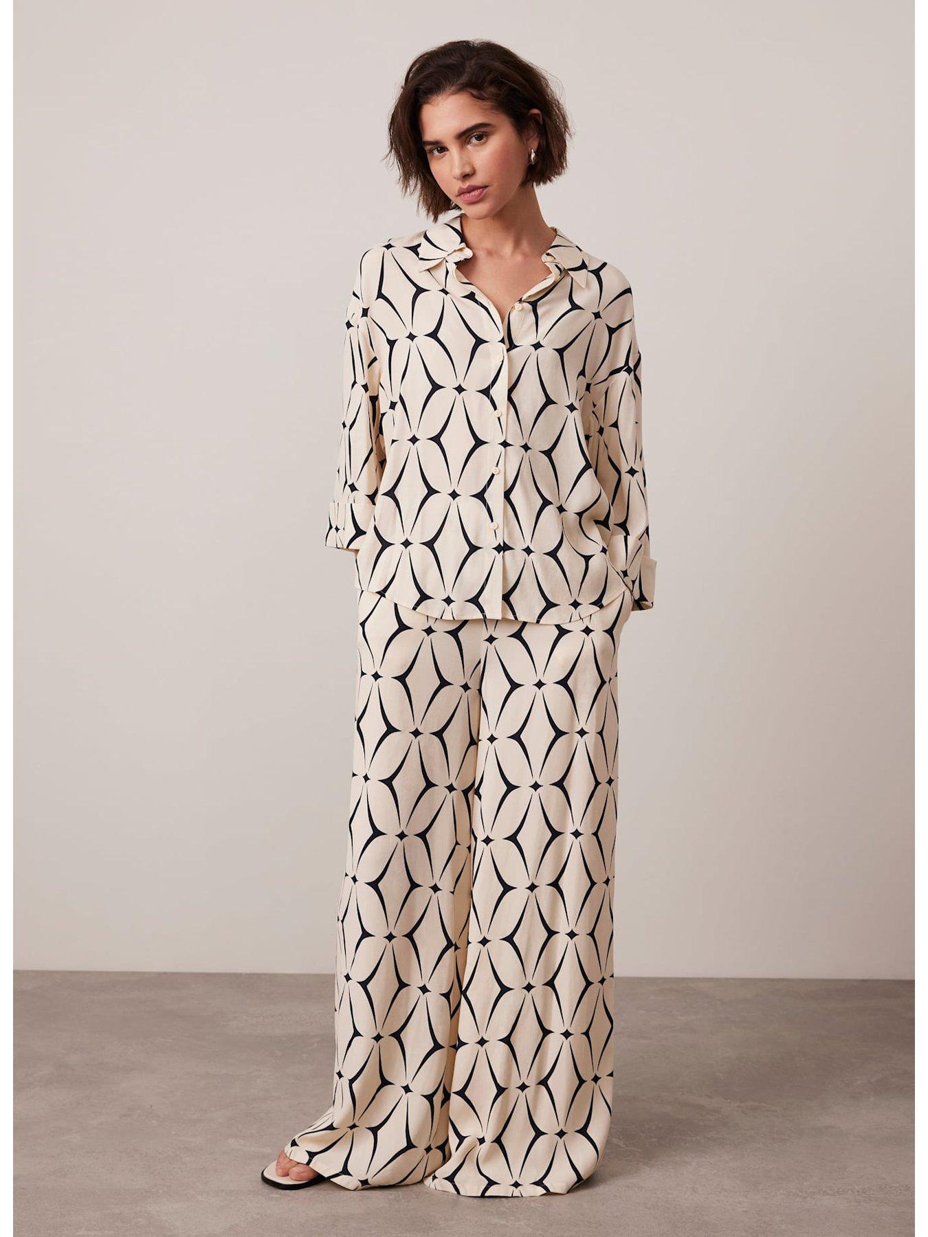  image of mint-velvet-cream-geometric-print-wide-leg-trousers
