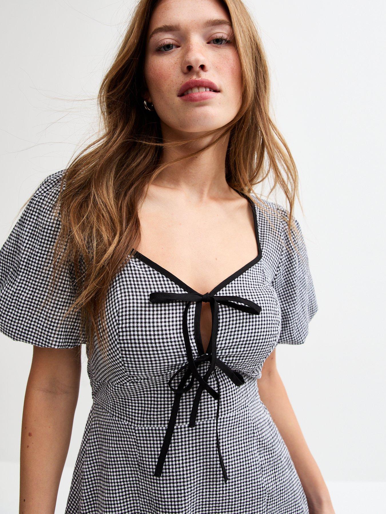  image of new-look-gingham-tie-neck-mini-dress-black