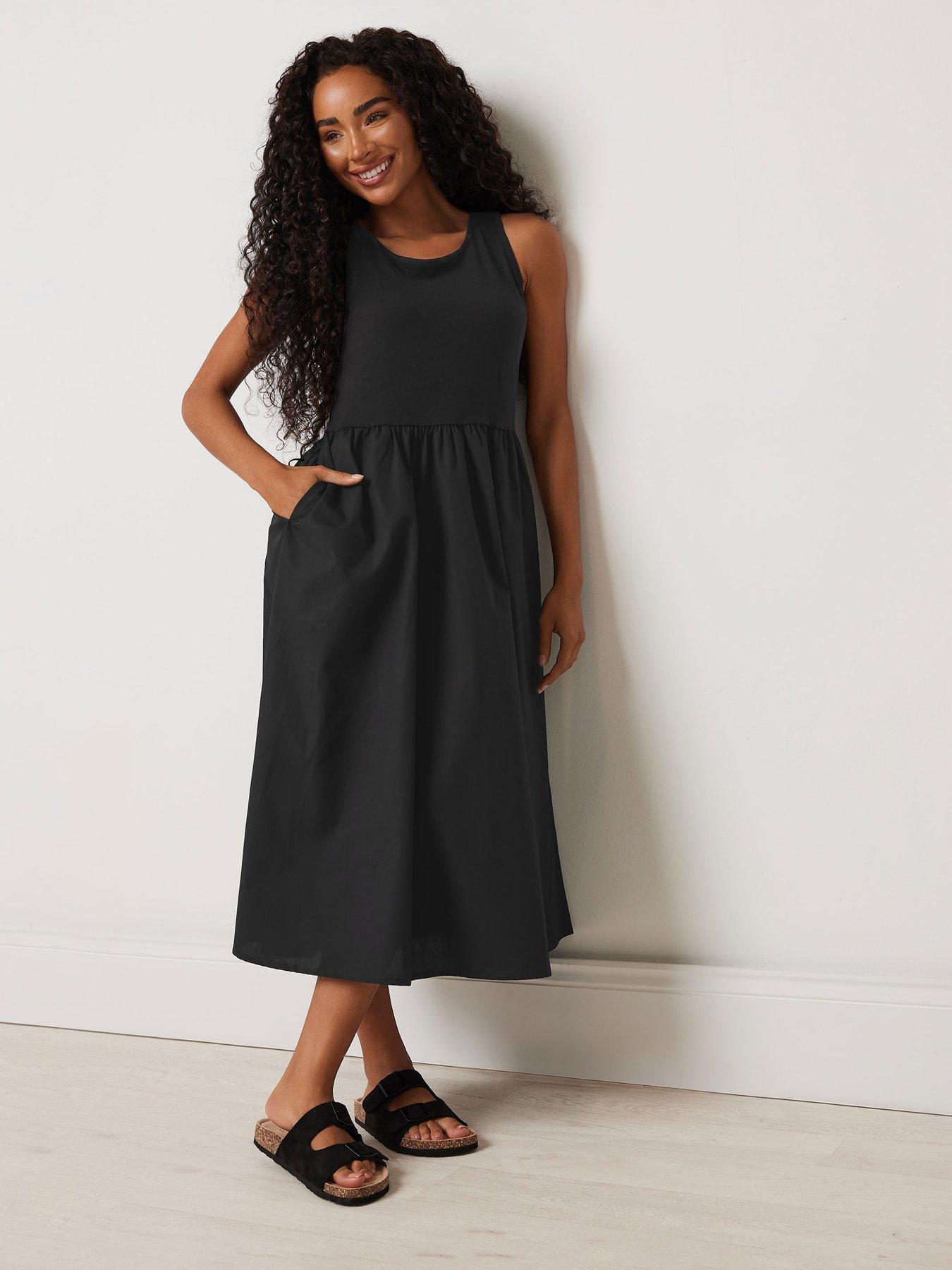  image of mco-petite-sleeveless-midi-dress-black