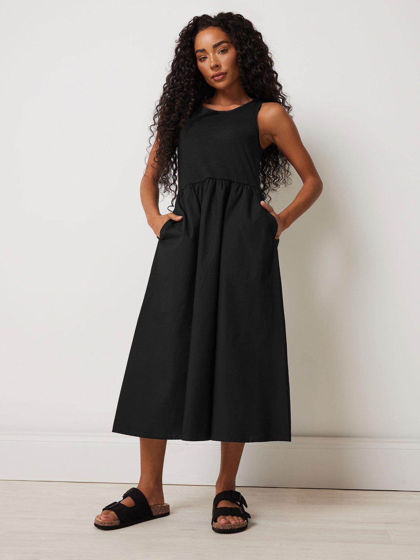  image of mco-petite-sleeveless-midi-dress-black
