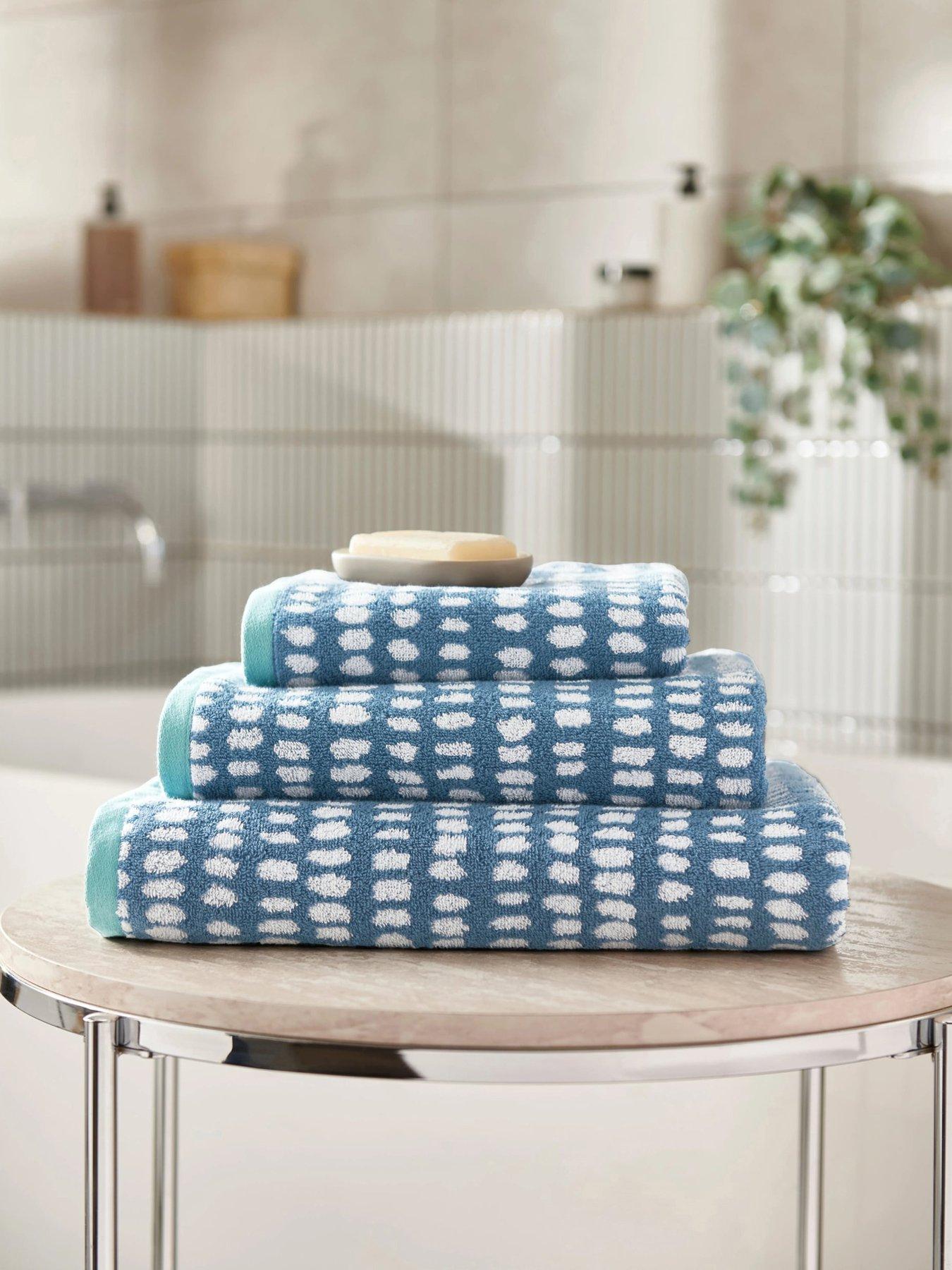 front image of copenhagen-home-arri-100-cotton-towel-collection-blue