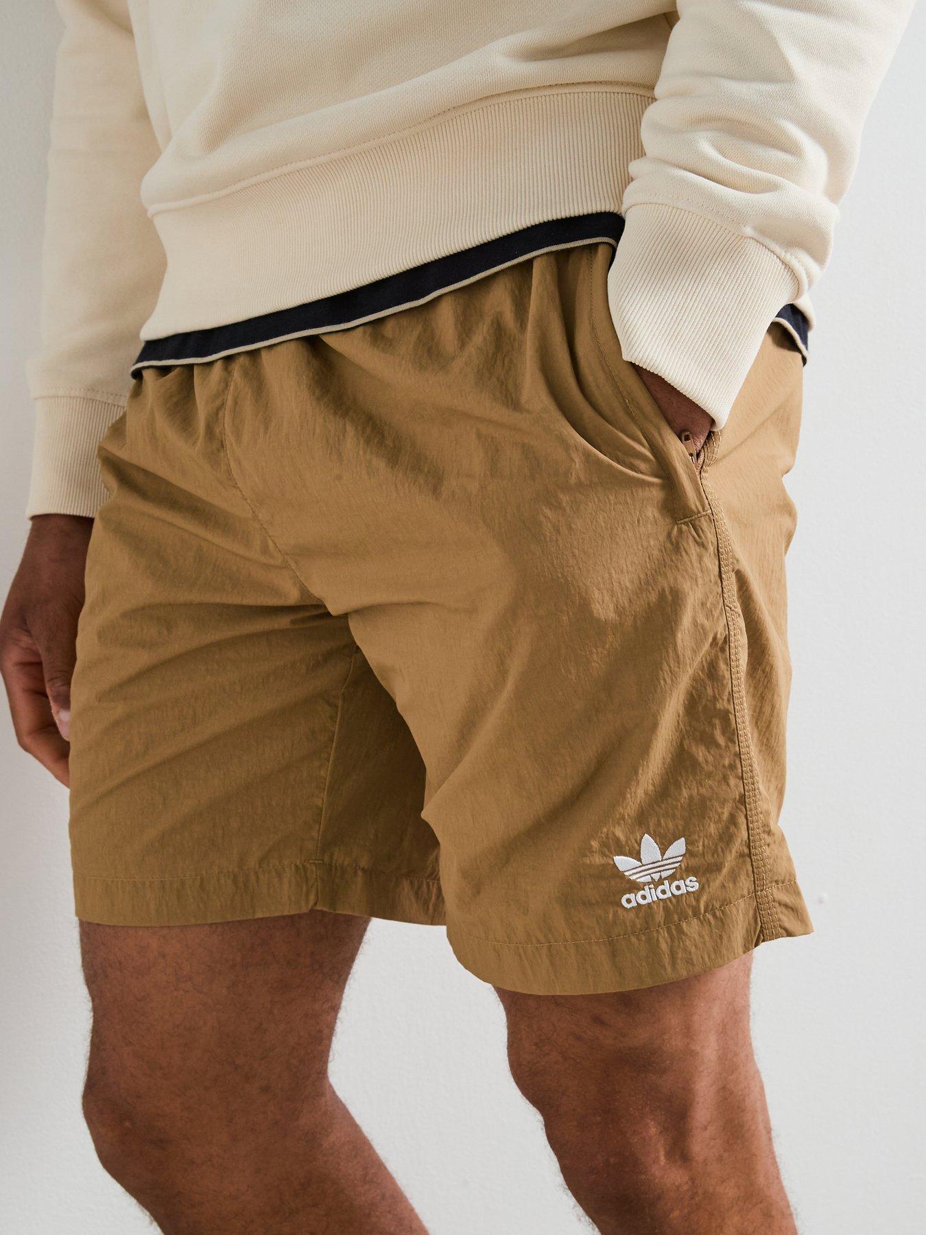  image of adidas-originals-mens-trefoil-essential-woven-shorts-brown