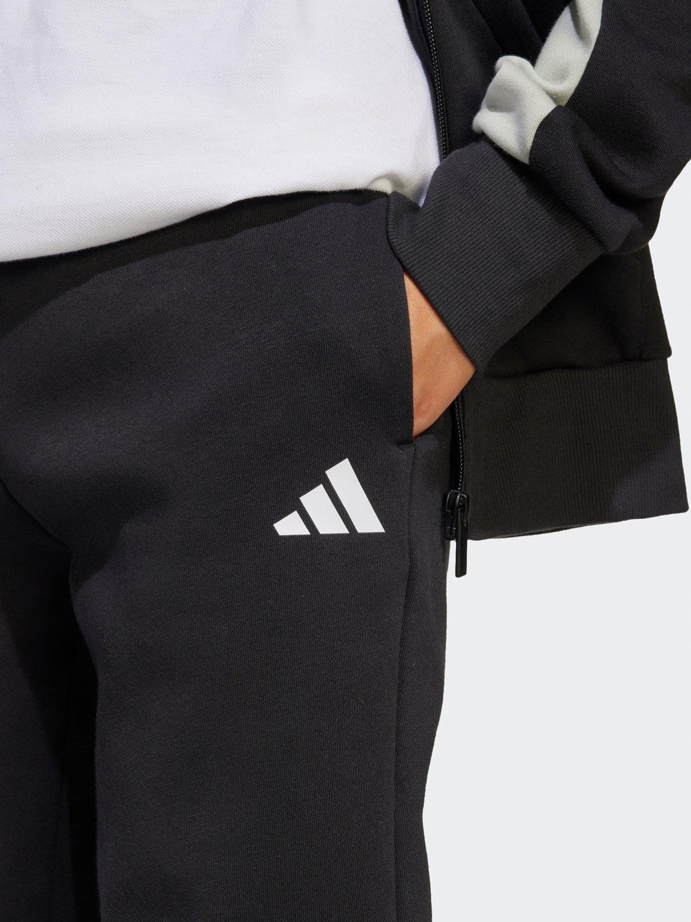 Image 5 of 5 of adidas Sportswear Junior Unisex Seasonal Essentials Colorblock Fleece Tracksuit -black