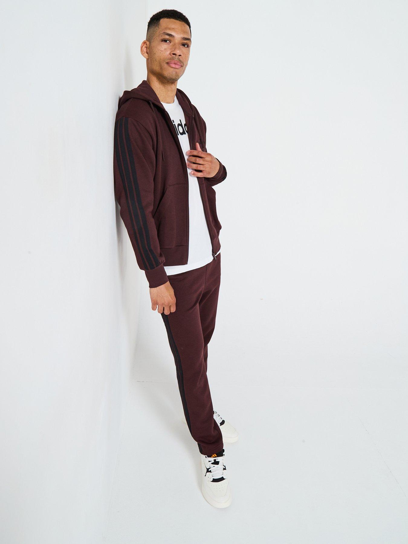  image of adidas-sportswear-mens-essentials-3-stripes-fleece-joggers-brown