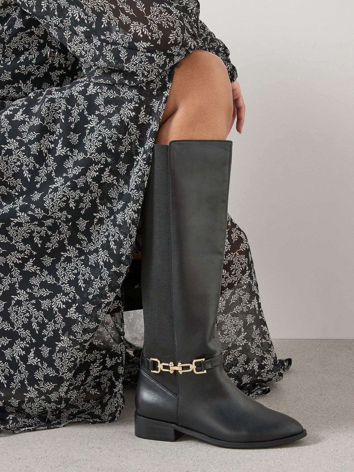 Image 1 of 8 of The Very Collection Elastic Panel Riding Knee Boot - Black