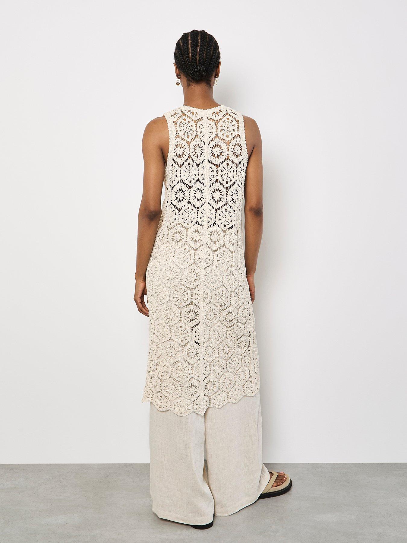  image of apricot-crochet-circles-sless-cardigan