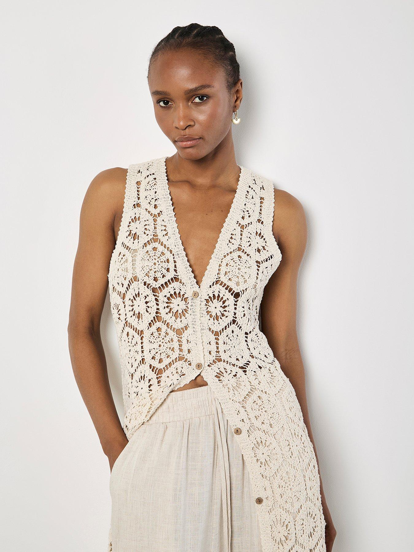  image of apricot-crochet-circles-sless-cardigan