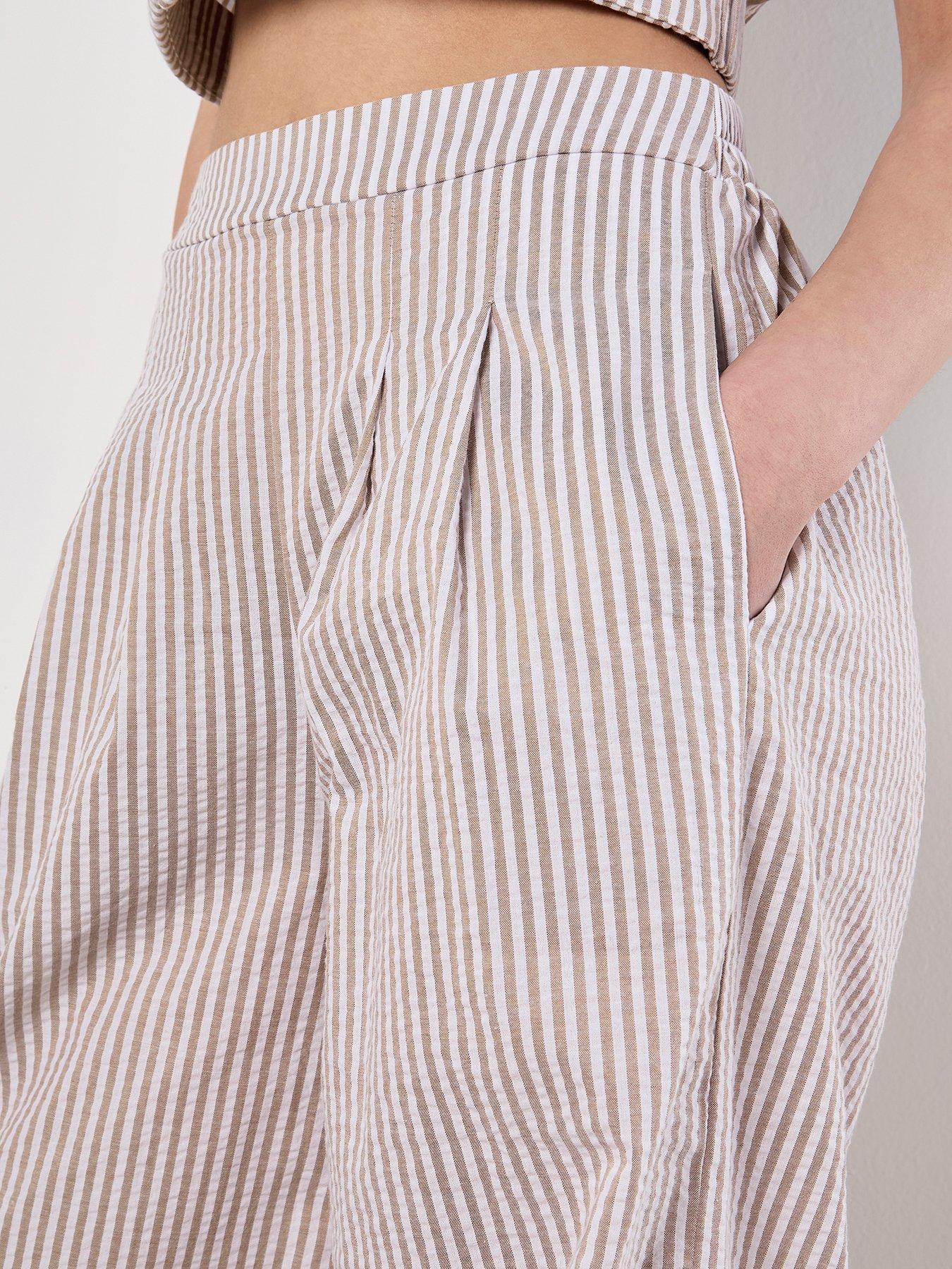 image of apricot-stripe-seersucker-pleat-trouser-cream