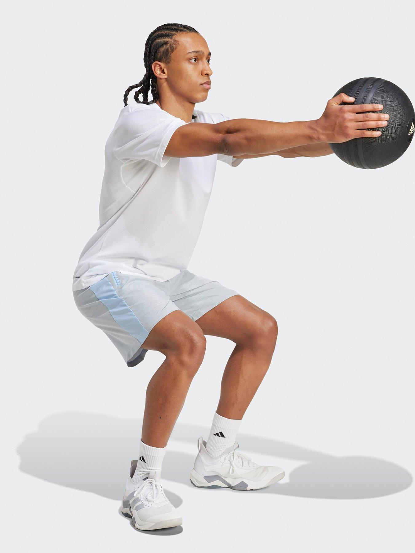  image of adidas-mens-training-essentials-woven-melange-7inch-shorts-blue