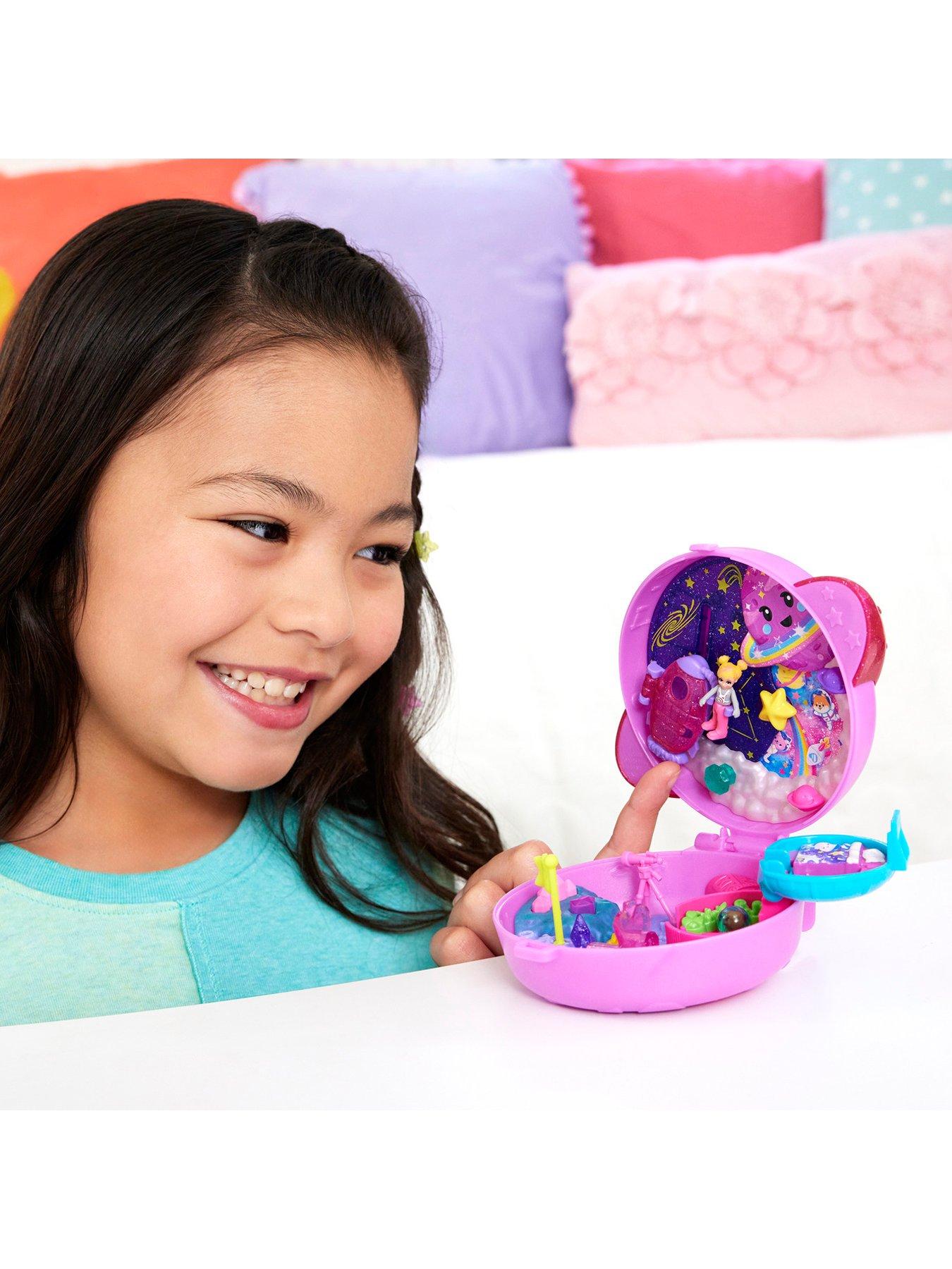 stillFront image of polly-pocket-polly-pocket-planet-polly-compact-playset-with-1-micro-doll-and-pet-puppy-travel-toy-with-themed-accessories