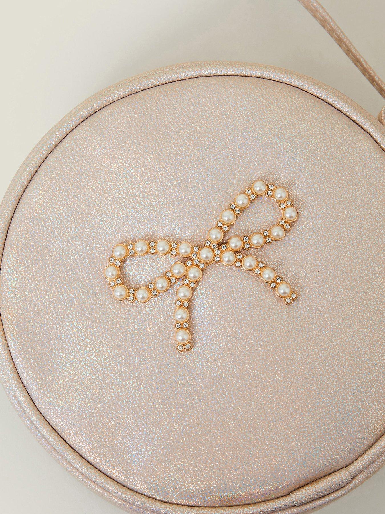  image of accessorize-girls-pearl-bow-round-bag-pink