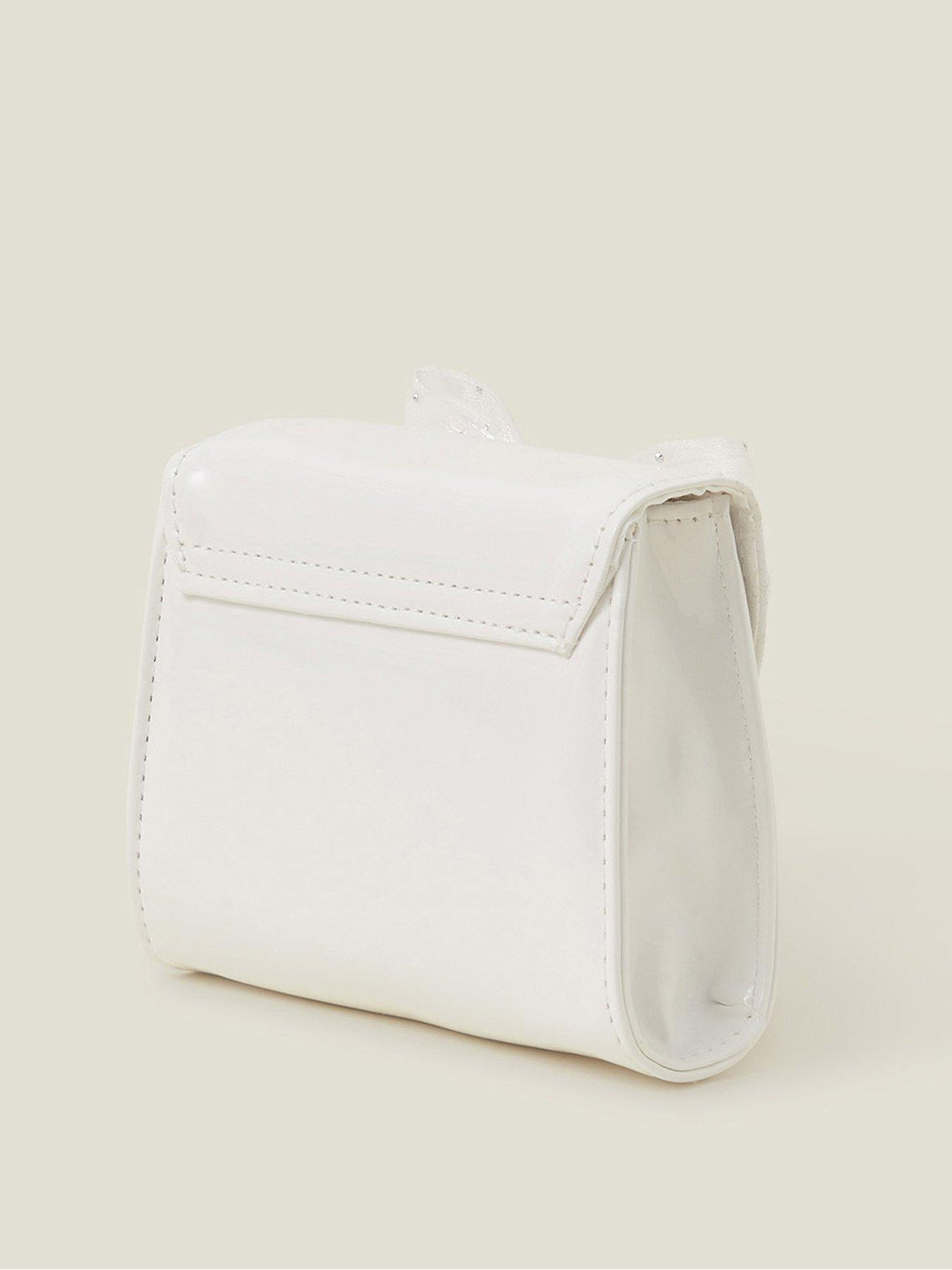  image of accessorize-girls-patent-bow-bag-light-cream