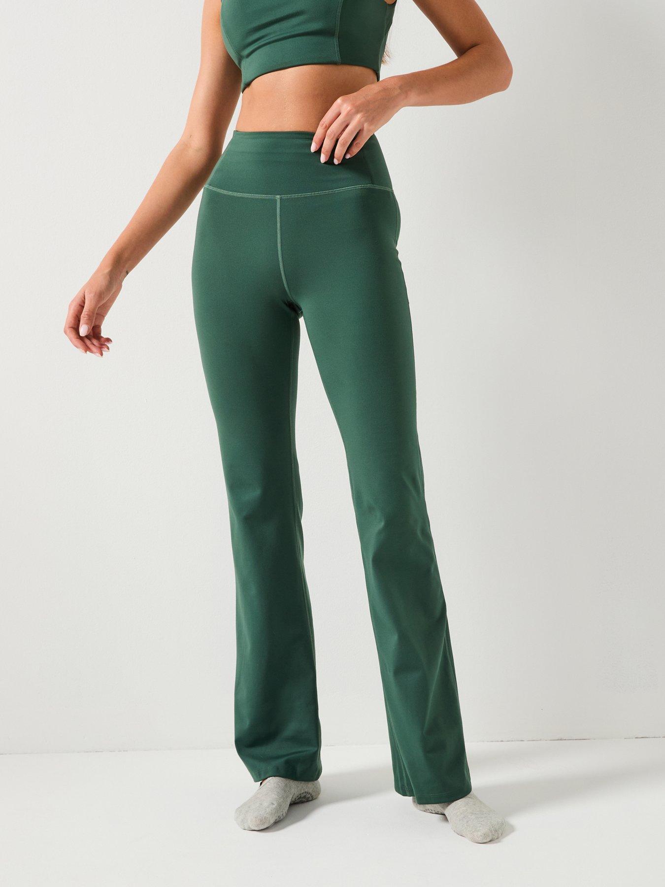  image of girlfriend-collective-womens-training-flare-legging-green