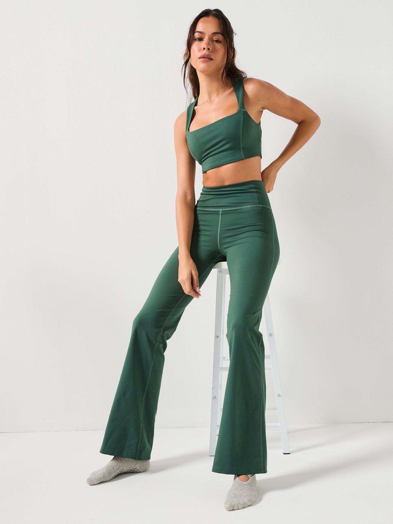  image of girlfriend-collective-womens-training-flare-legging-green