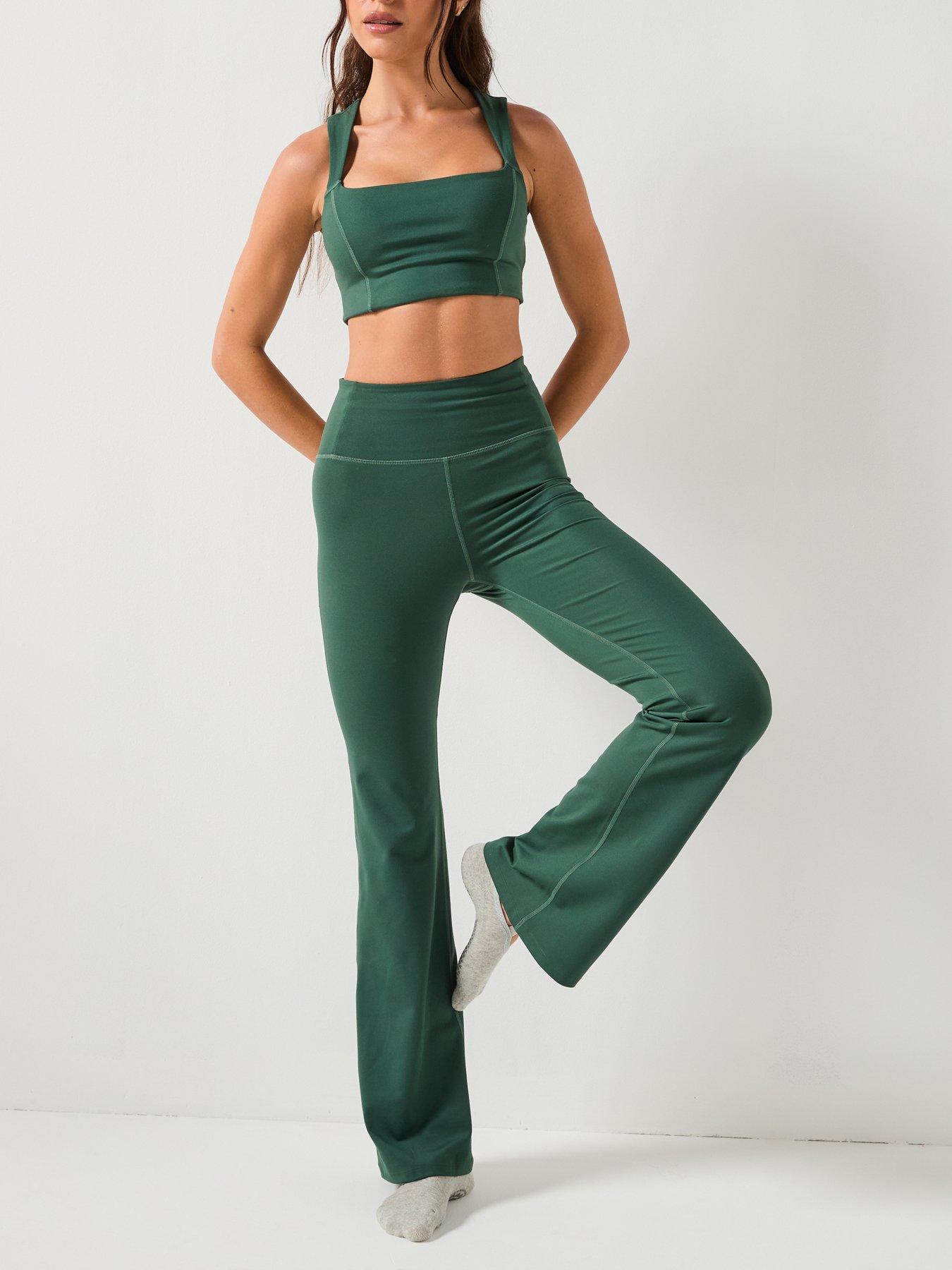  image of girlfriend-collective-womens-training-flare-legging-green