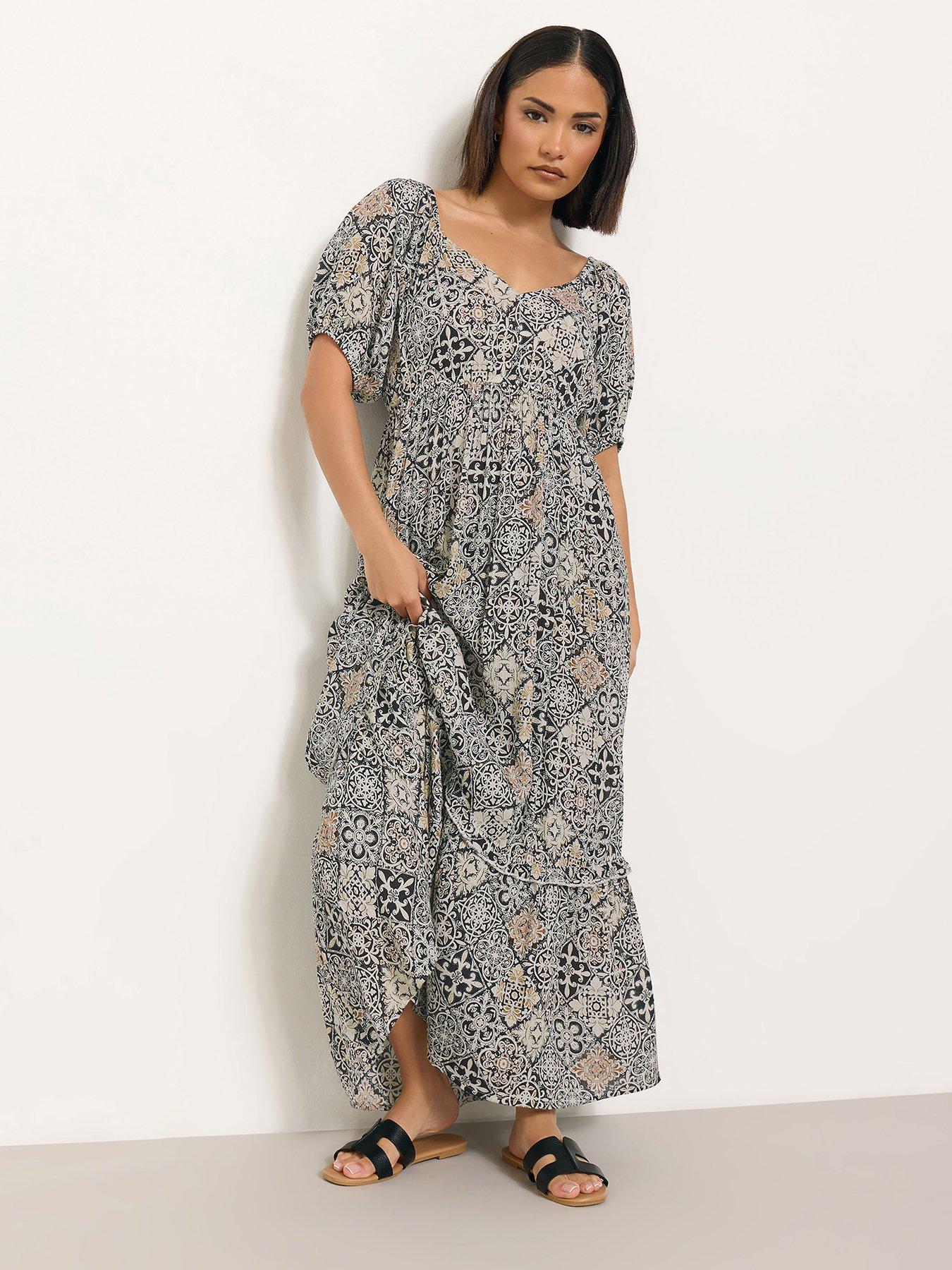 ladies halter neck maxi dress Ire Cut-Out Halter Neck Maxi Dress – KÍLÉNTÁR main image 1