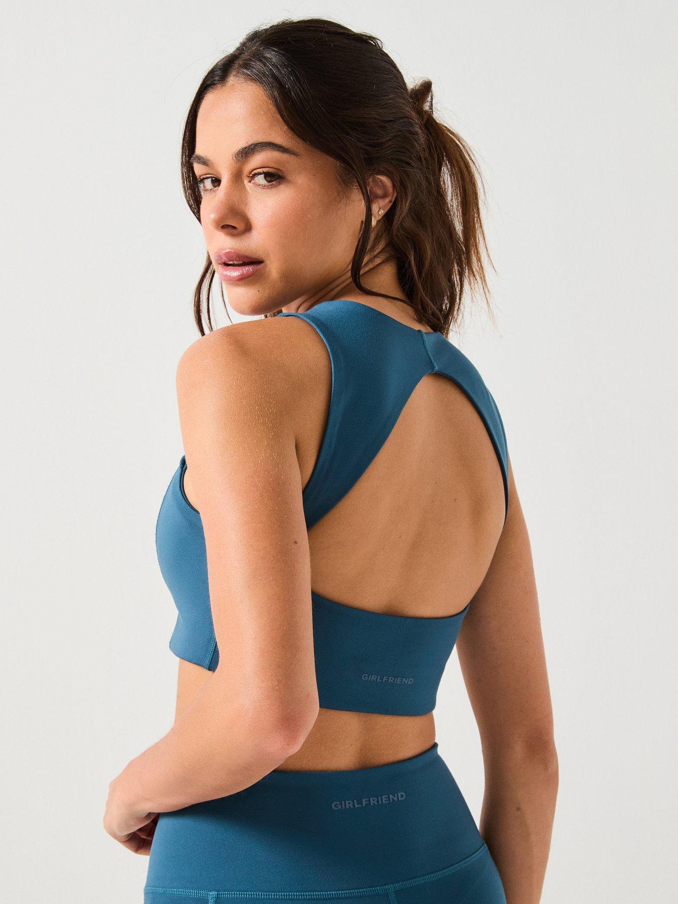  image of girlfriend-collective-womens-training-natalie-seamed-bra-open-back-blue