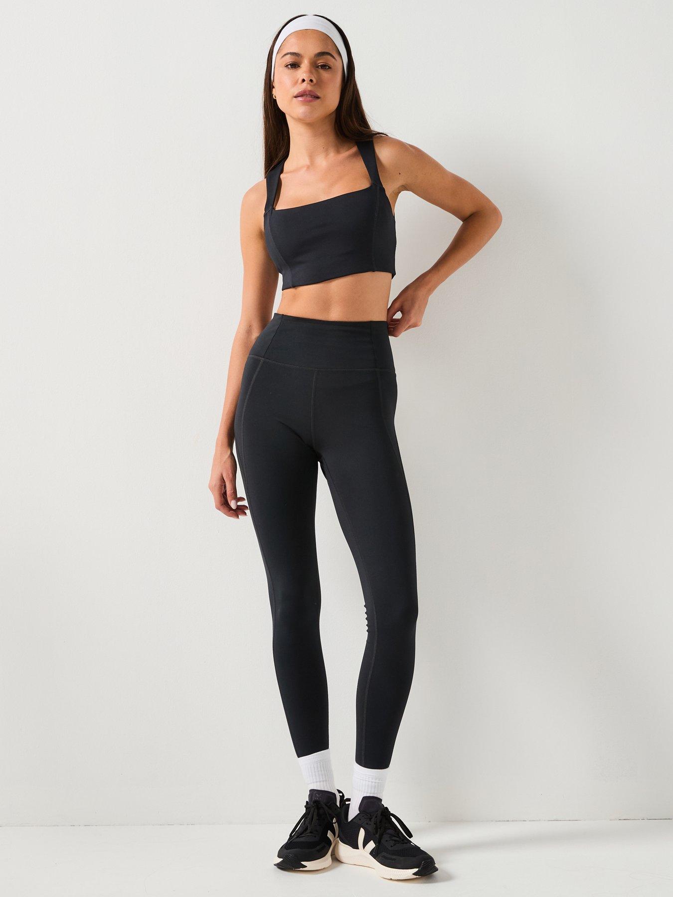  image of girlfriend-collective-womens-training-natalie-seamed-bra-open-back-black