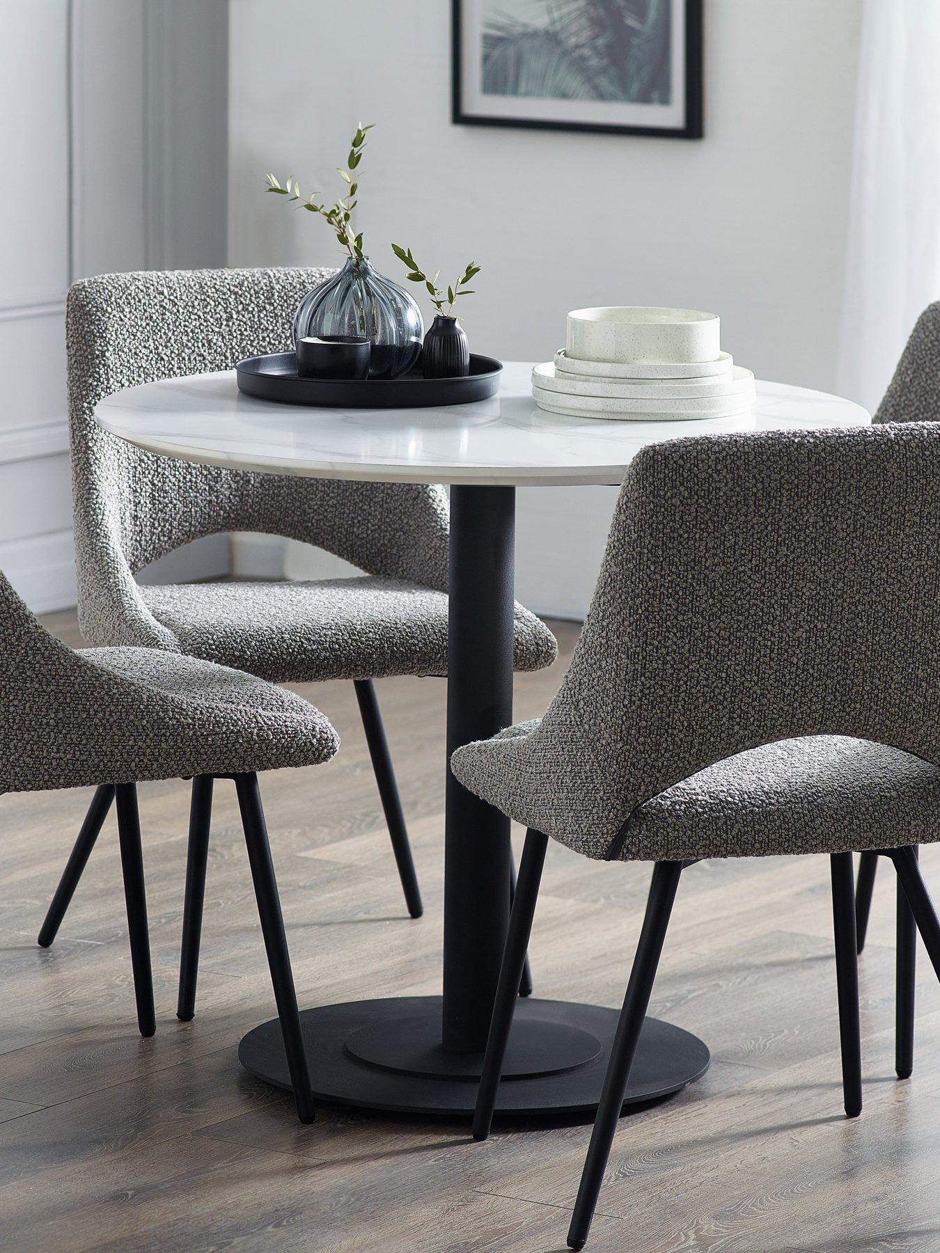  image of julian-bowen-luca-round-table