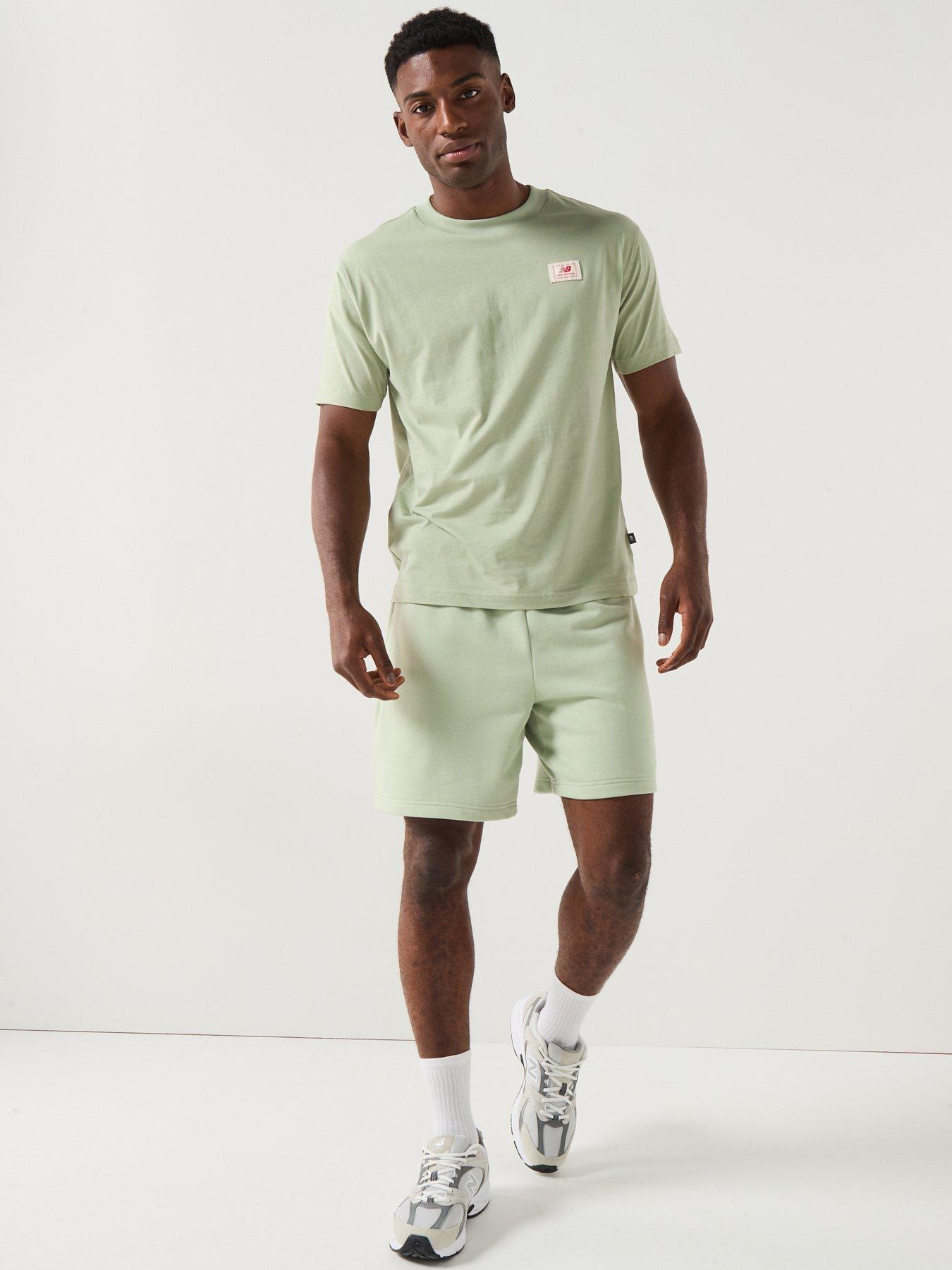  image of new-balance-mens-woven-label-t-shirt-green