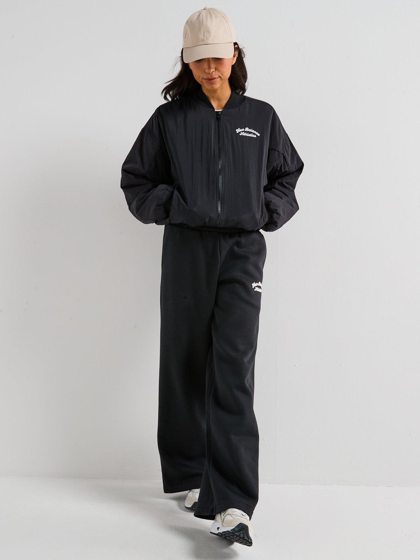 Image 6 of 6 of New Balance Womens Linear Heritage Woven Bomber Jacket- Black