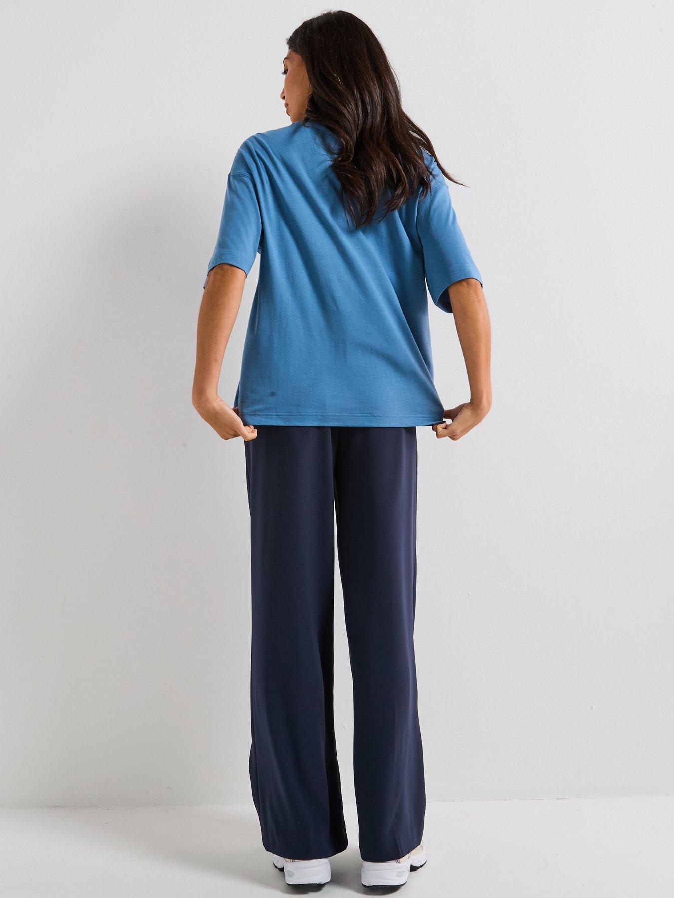  image of new-balance-womens-linear-heritage-oversized-t-shirt-blue