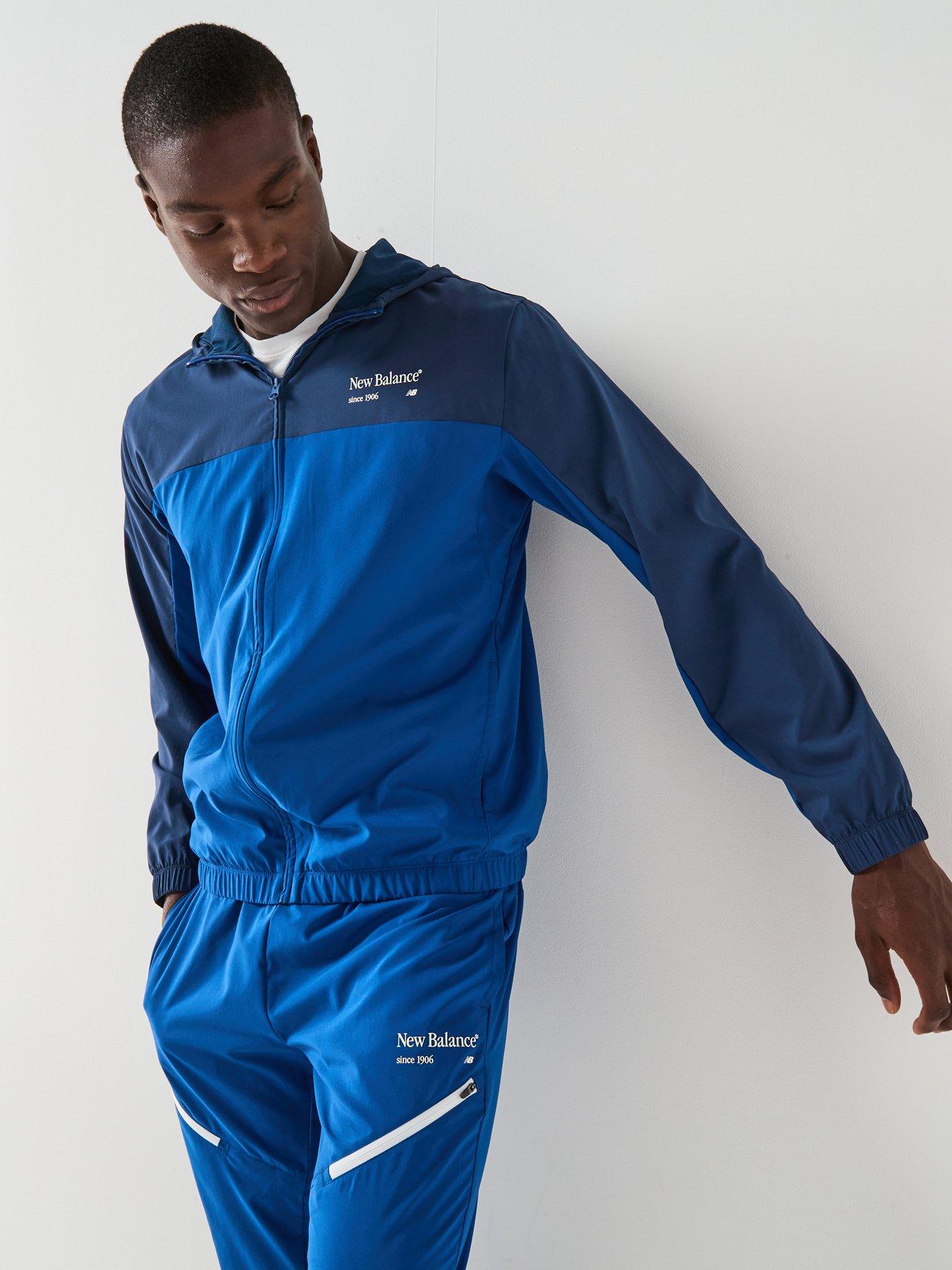 New Balance Mens Reimagined Woven Graphic Jacket - Blue
