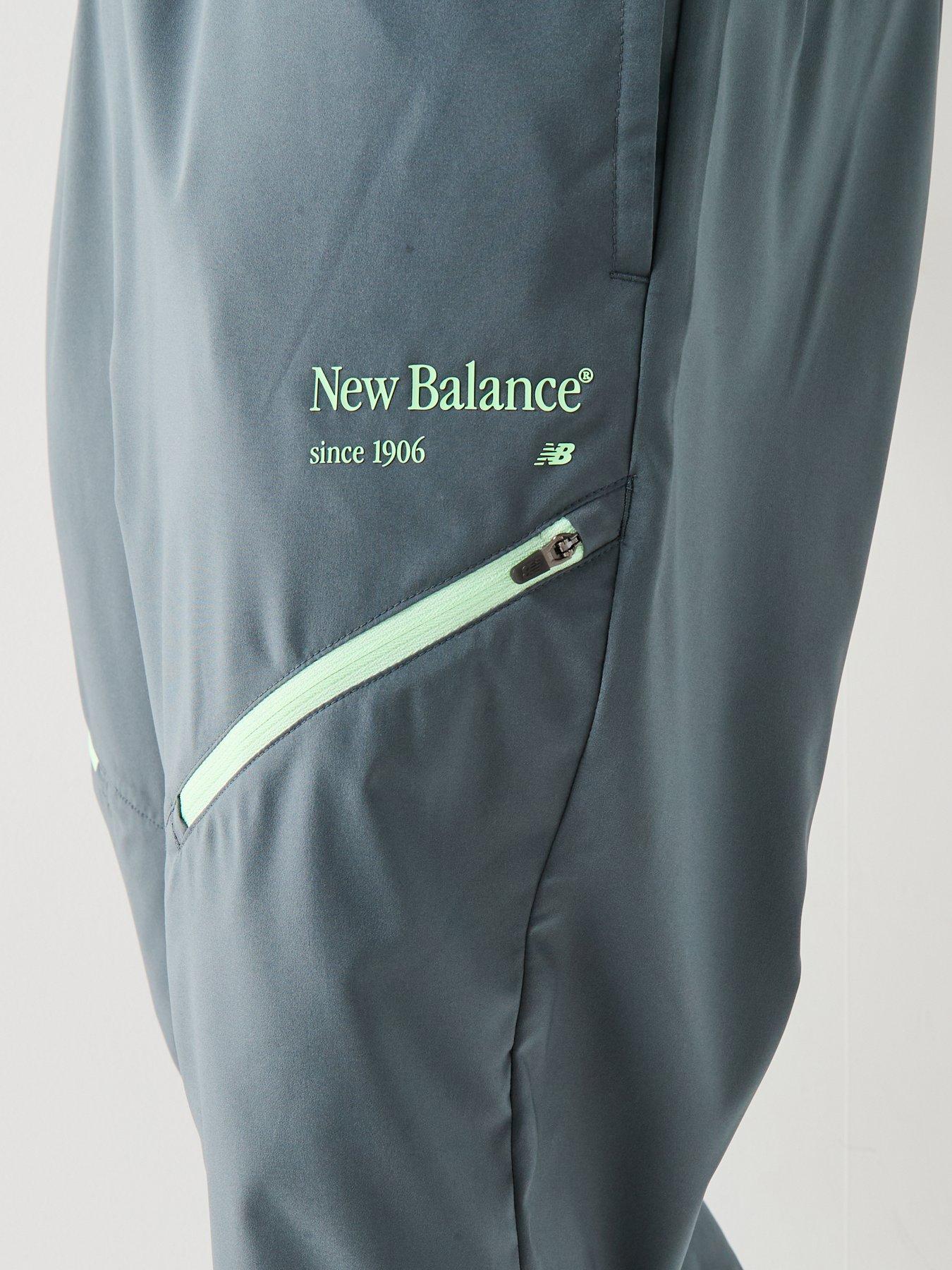  image of new-balance-mens-reimagined-woven-jogger-grey