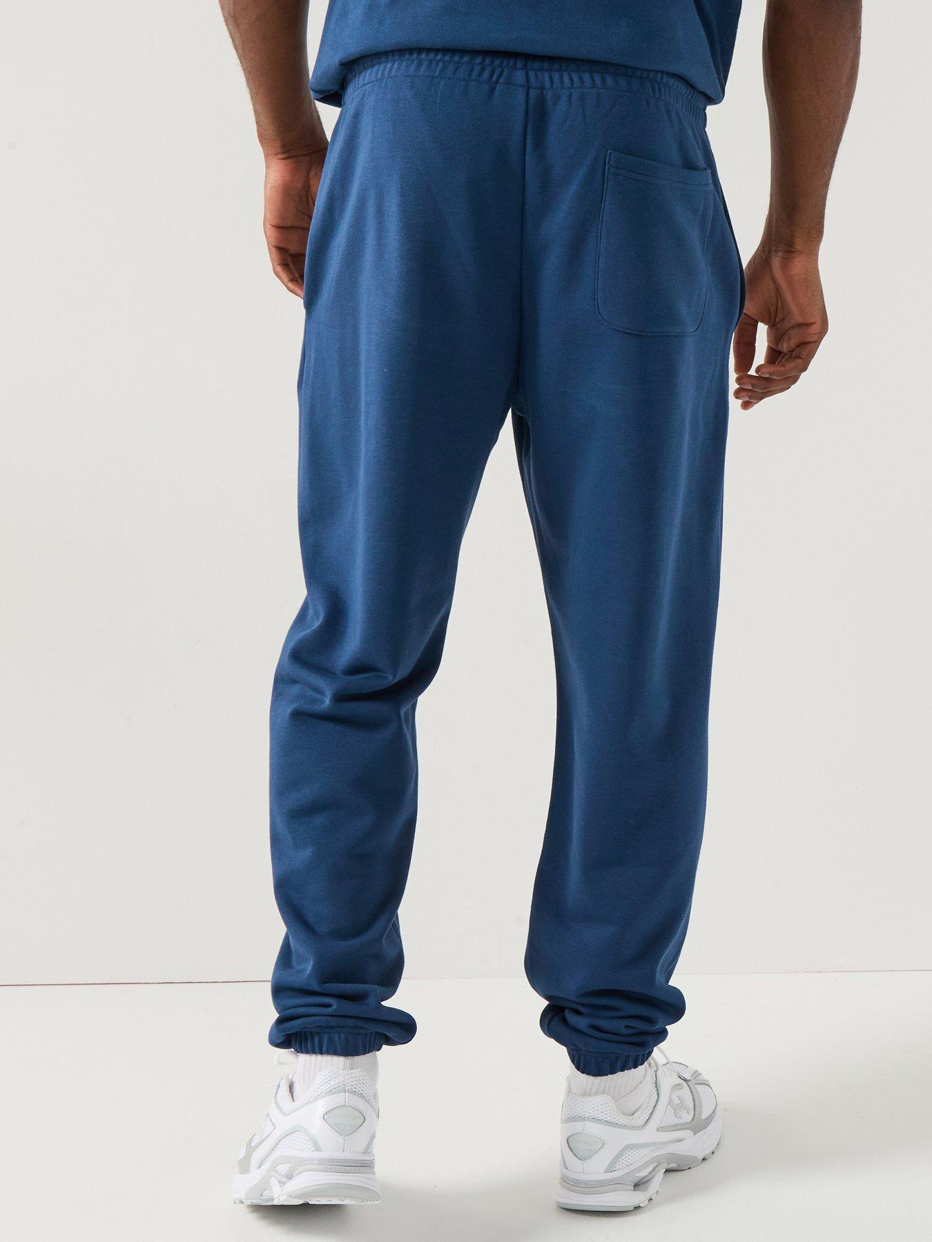  image of new-balance-mens-sport-essentials-french-terry-joggers-blue