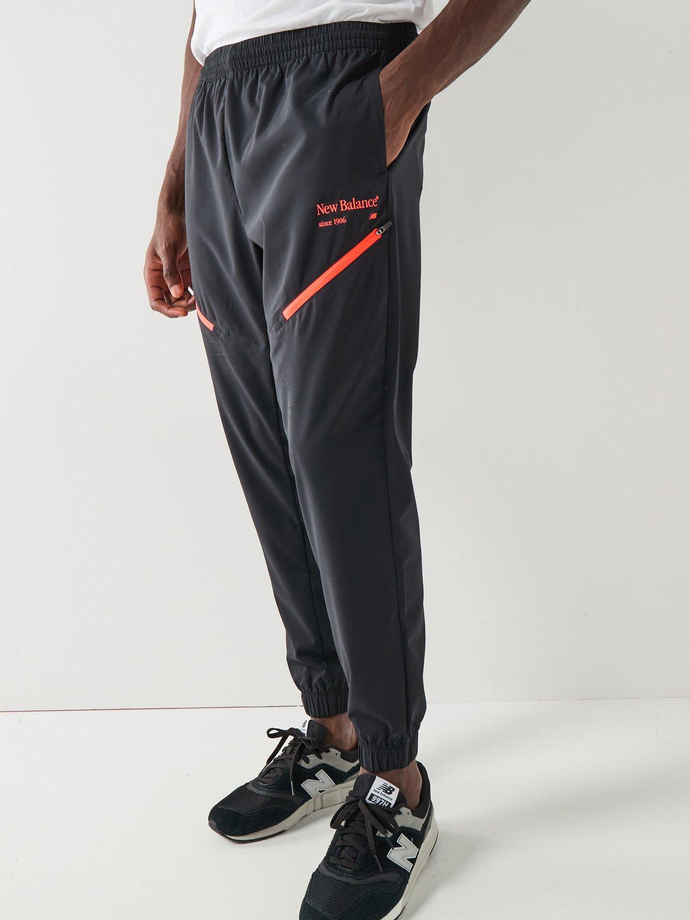  image of new-balance-mens-reimagined-woven-joggers-black