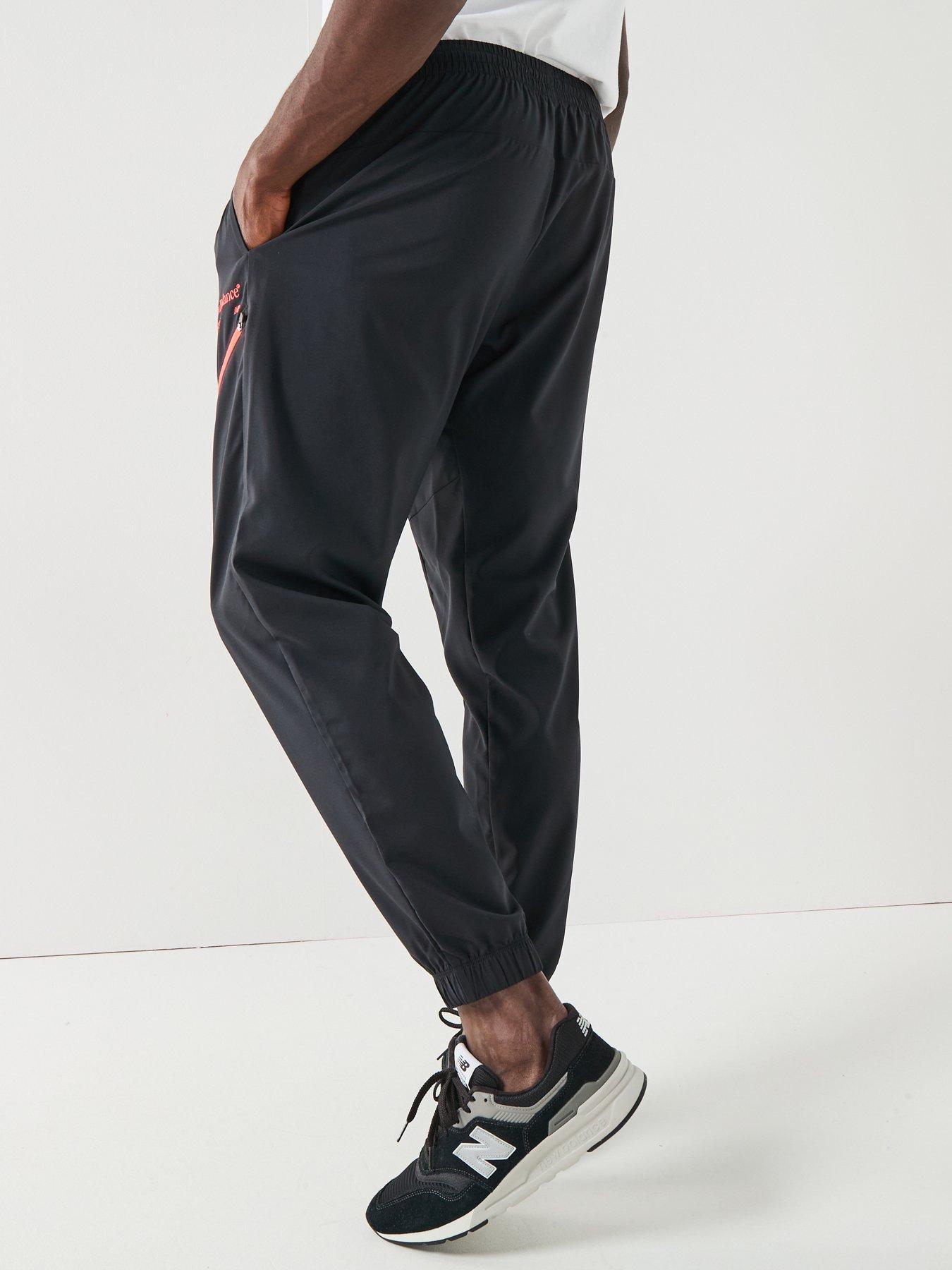  image of new-balance-mens-reimagined-woven-joggers-black