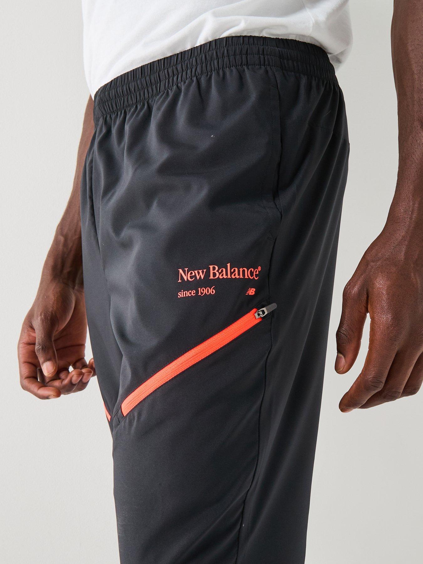  image of new-balance-mens-reimagined-woven-joggers-black