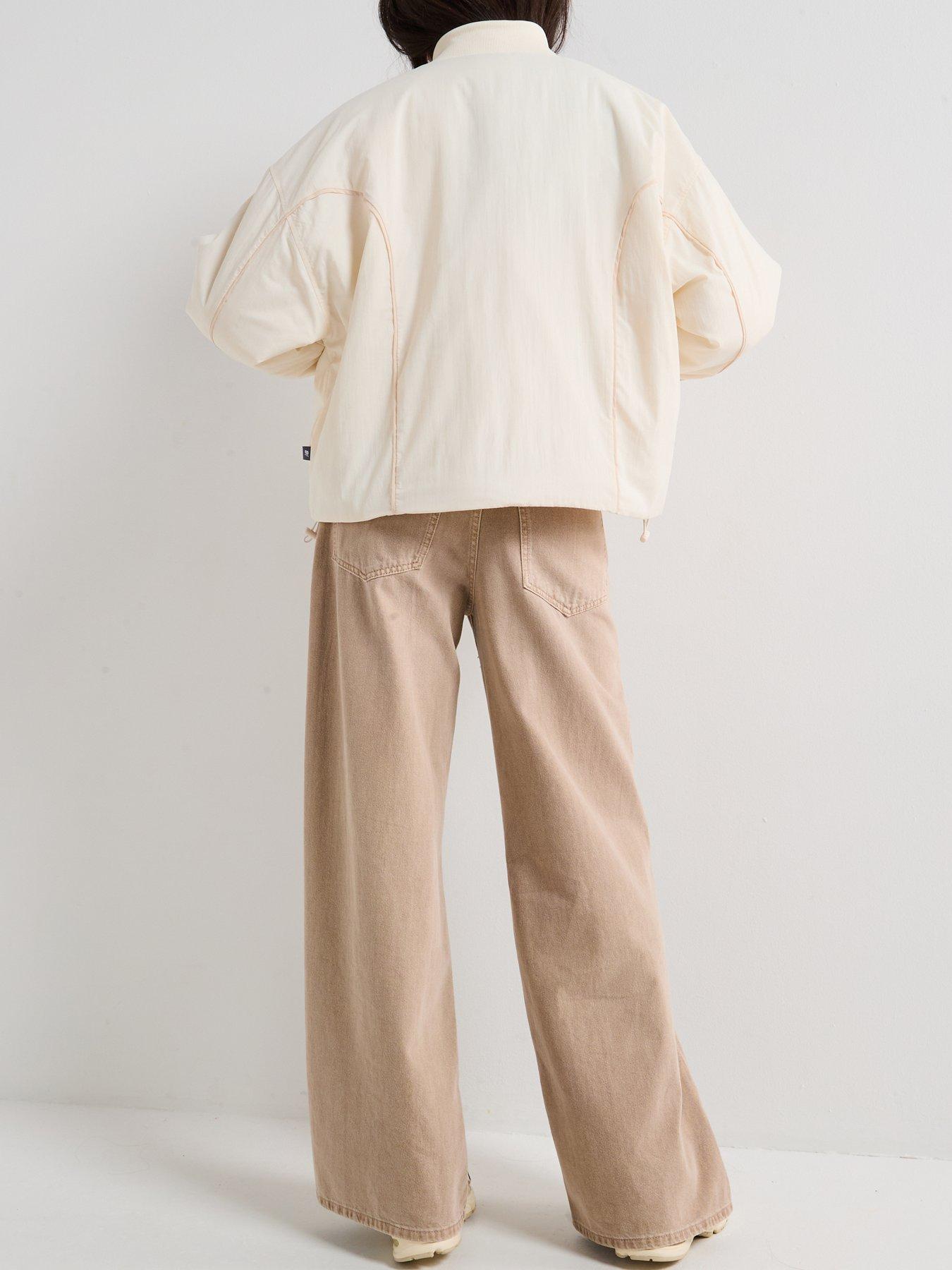  image of new-balance-womens-linear-heritage-woven-bomber-jacket-beige