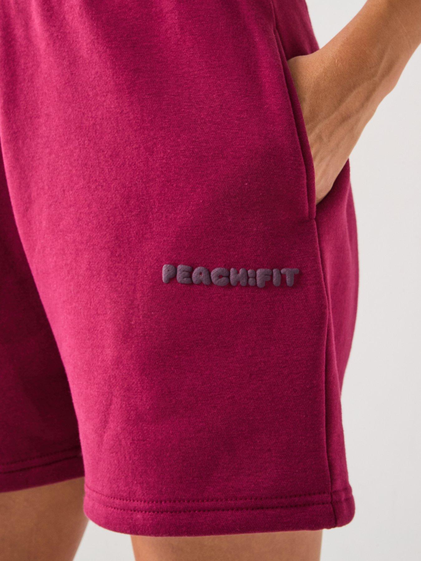  image of peach-fit-womens-cozy-season-short-dark-red