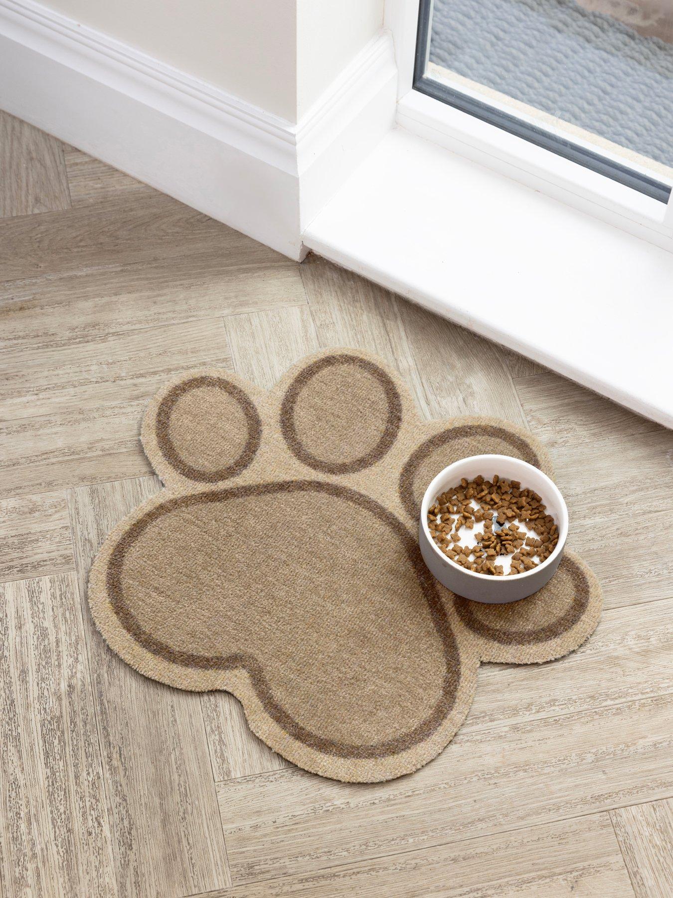 front image of the-very-collection-paw-shaped-mat-beige