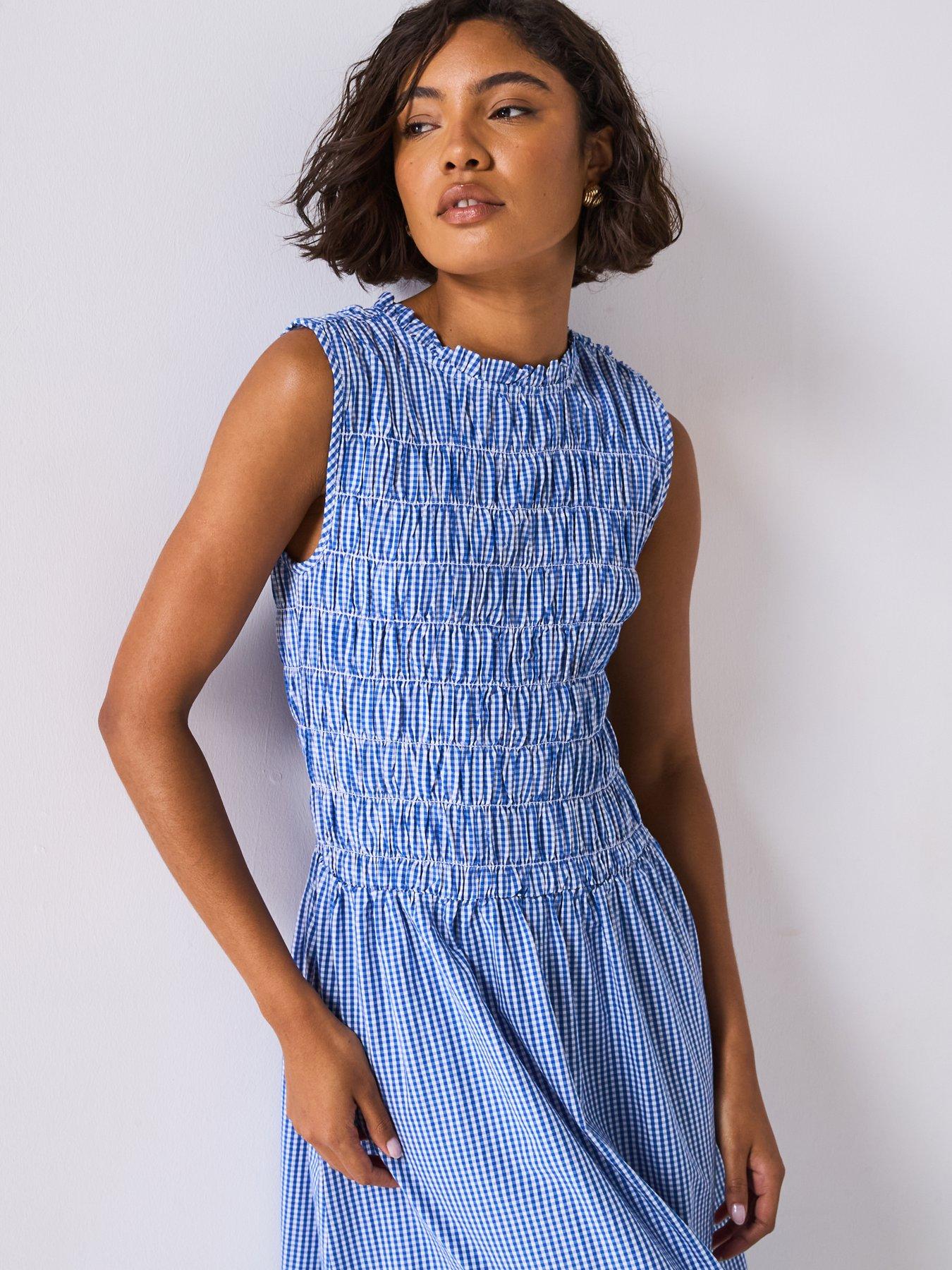 blue print dress Blue Floral Smocked Puff Print Midi Dress – Peacocks & Pearls Lexington