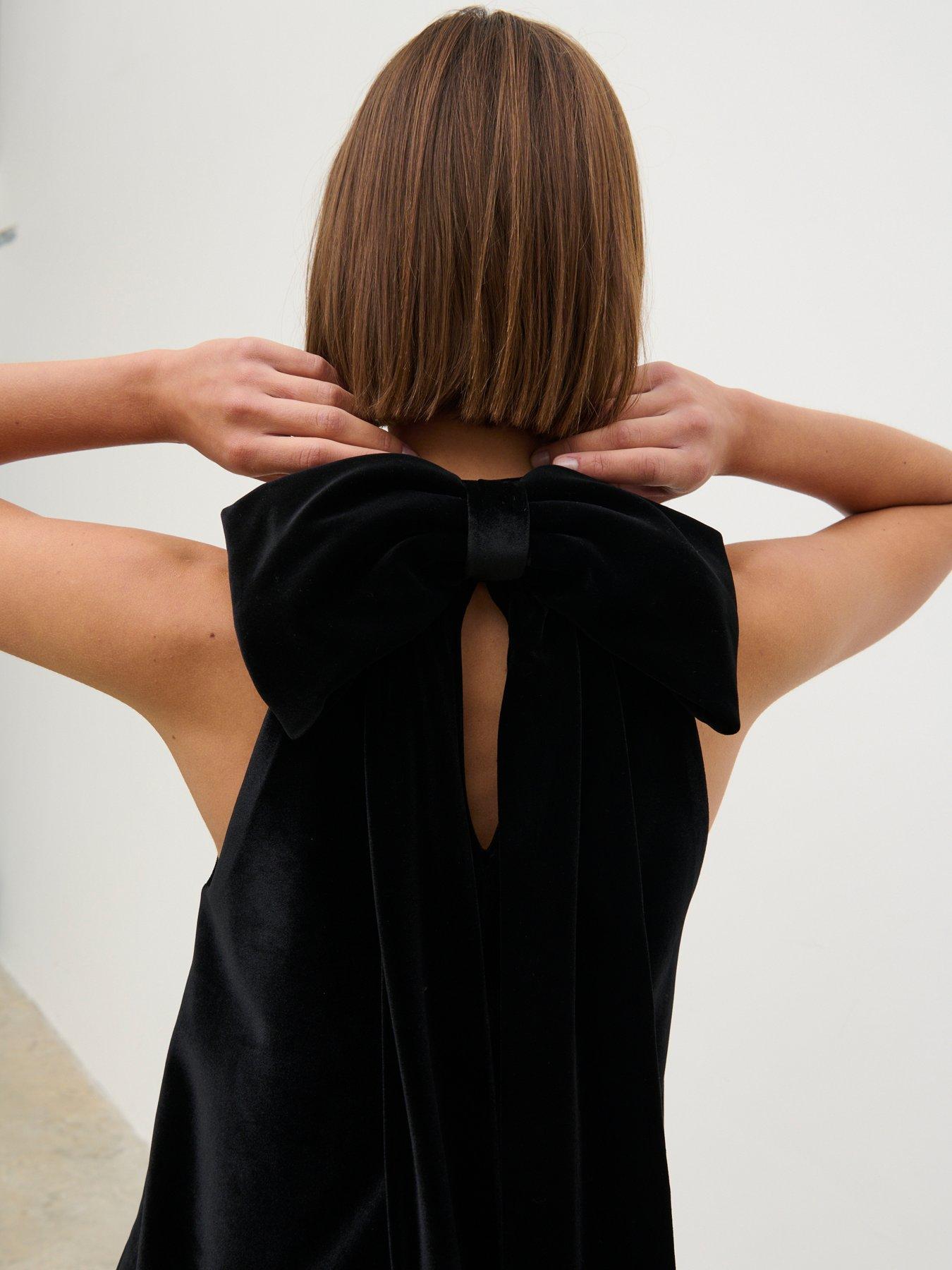 Image 4 of 4 of Pretty Lavish Bella Bow Velvet Mini Dress - Black