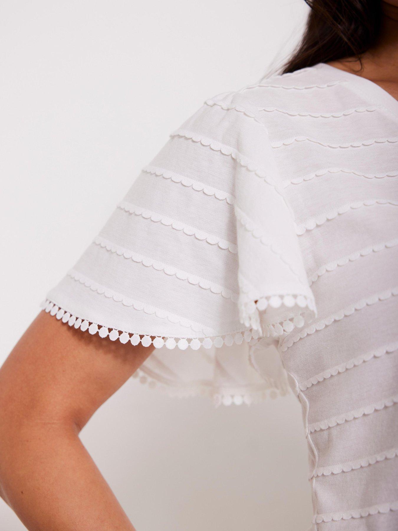  image of mint-velvet-ivory-v-neck-top