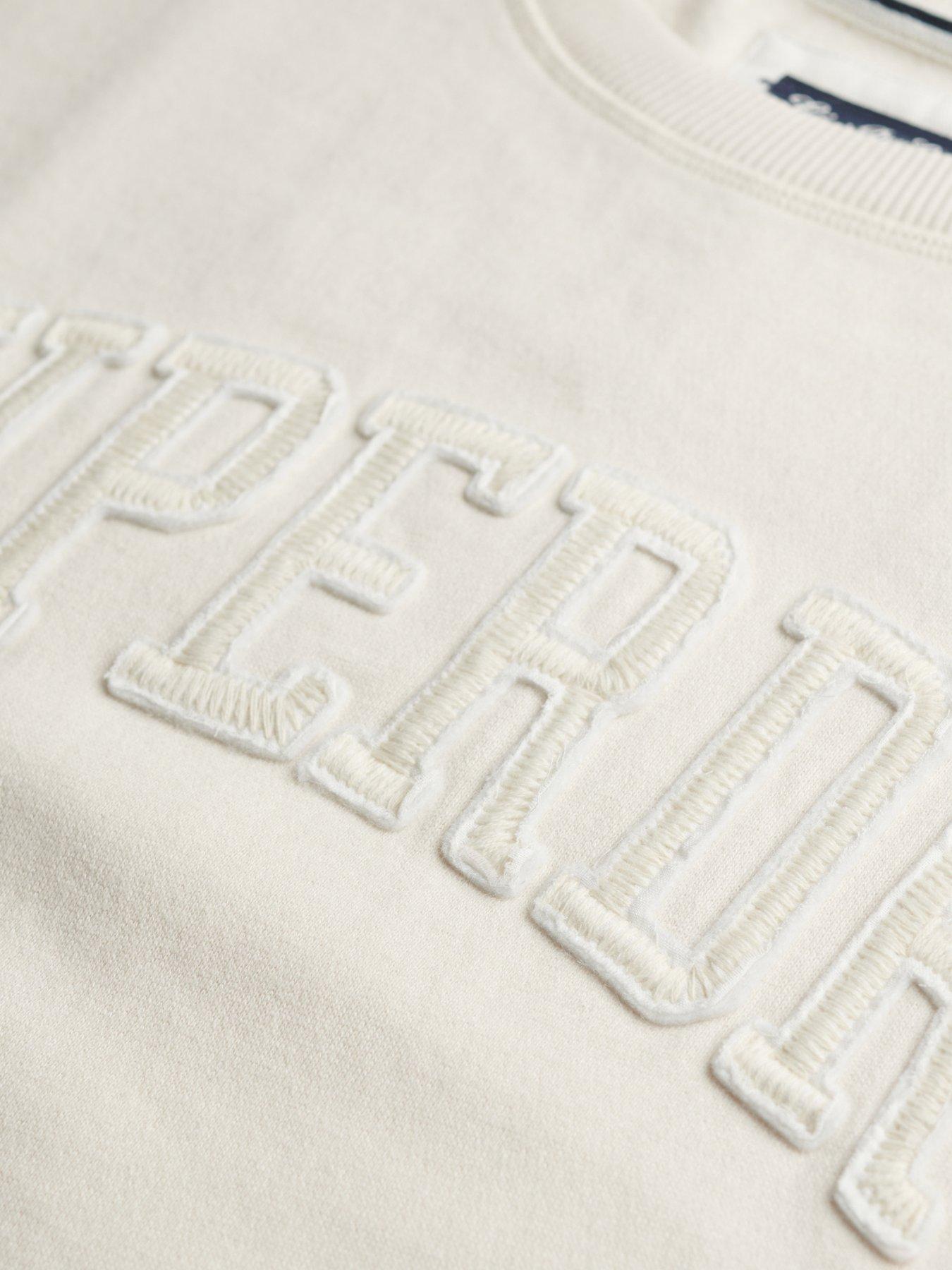  image of superdry-athletic-essentials-tonal-applique-crew-sweatshirt-white