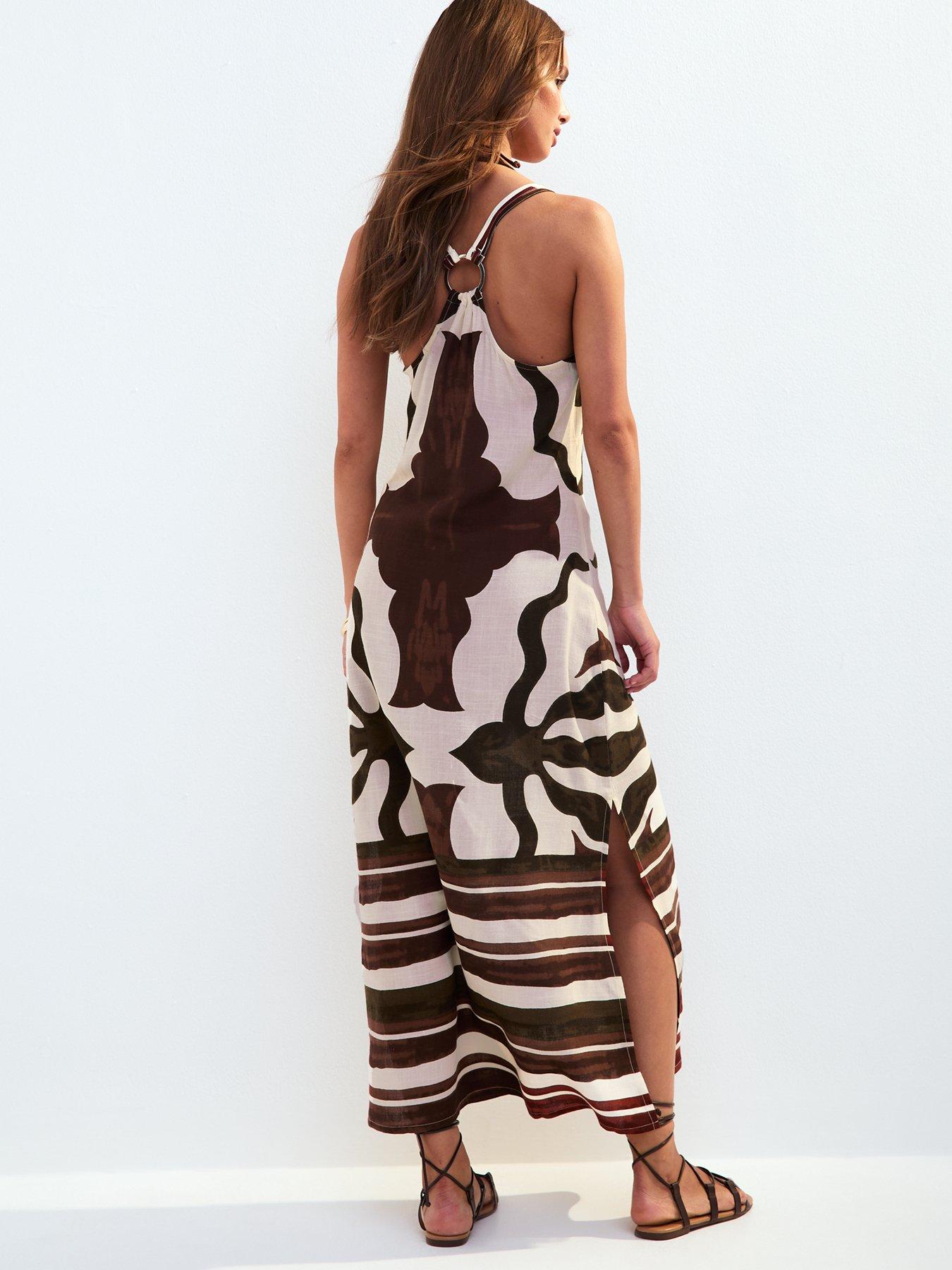 Image 2 of 5 of New Look Brown Leaf Print Halter Neck Back Ring Midi Dress