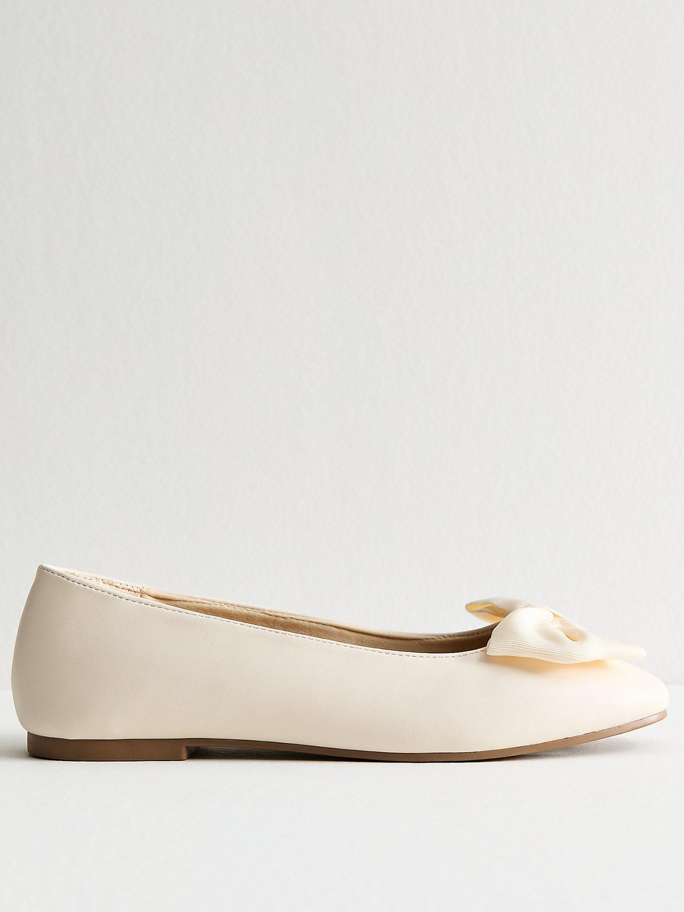 Image 1 of 6 of New Look Wide Fit Off White Faux Leather Bow Ballet Flats