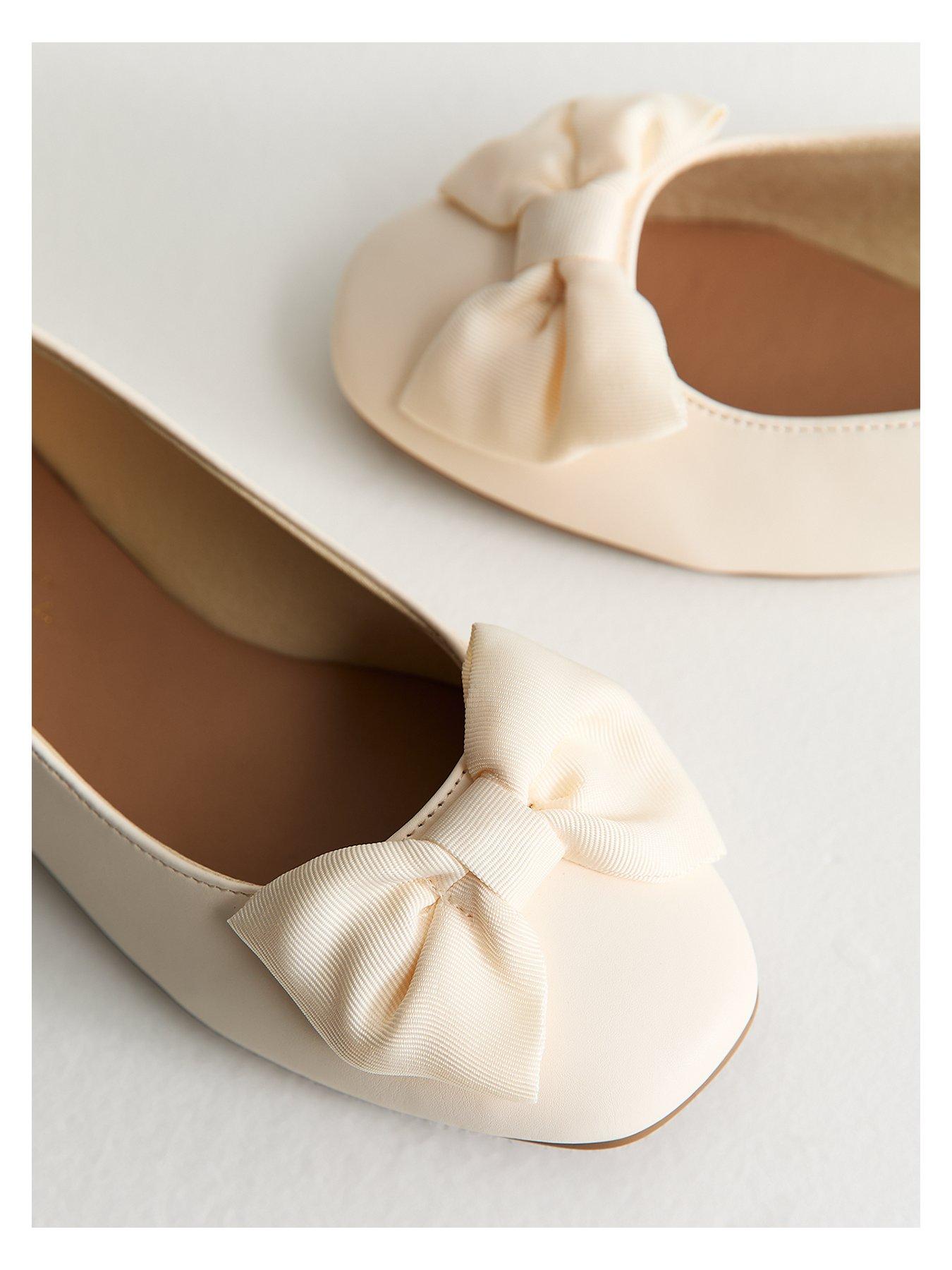 Image 4 of 6 of New Look Wide Fit Off White Faux Leather Bow Ballet Flats