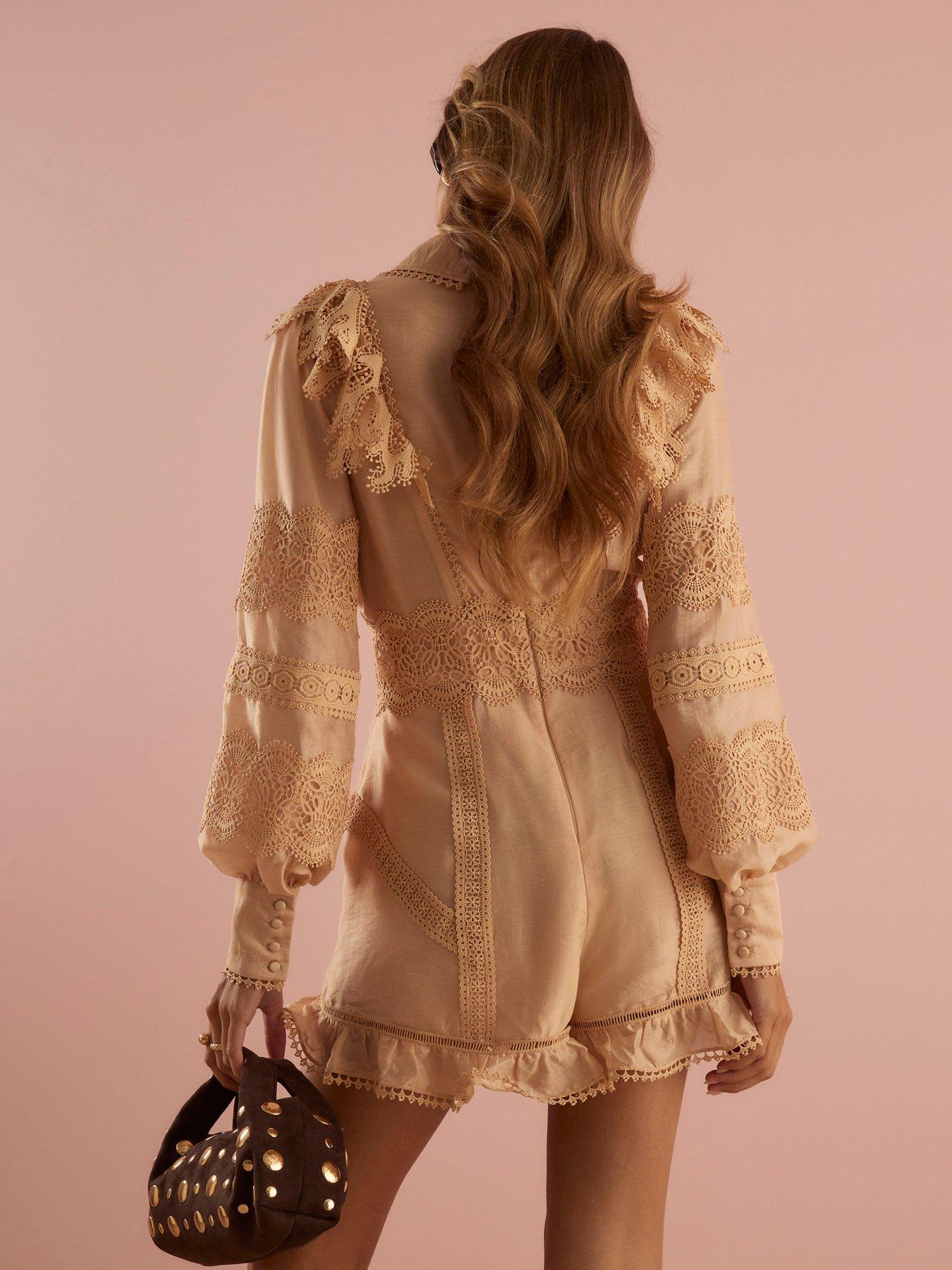 Image 2 of 4 of River Island Long Sleeve Ruffle Front Playsuit - Beige