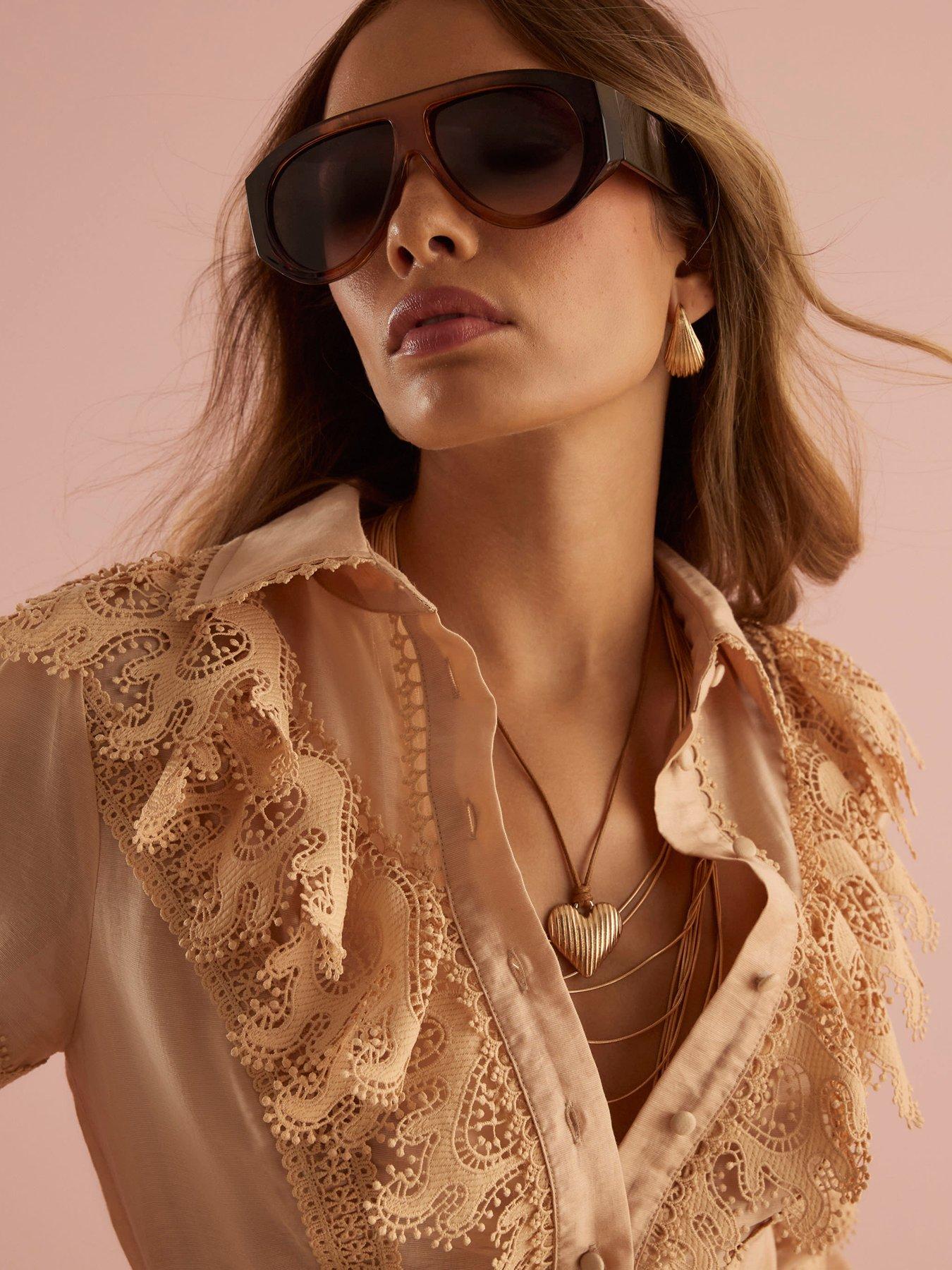 Image 4 of 4 of River Island Long Sleeve Ruffle Front Playsuit - Beige