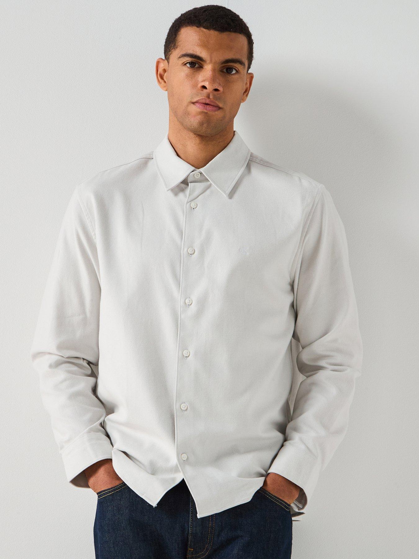 front image of calvin-klein-long-sleeve-melange-flannel-easy-fit-shirt-blue